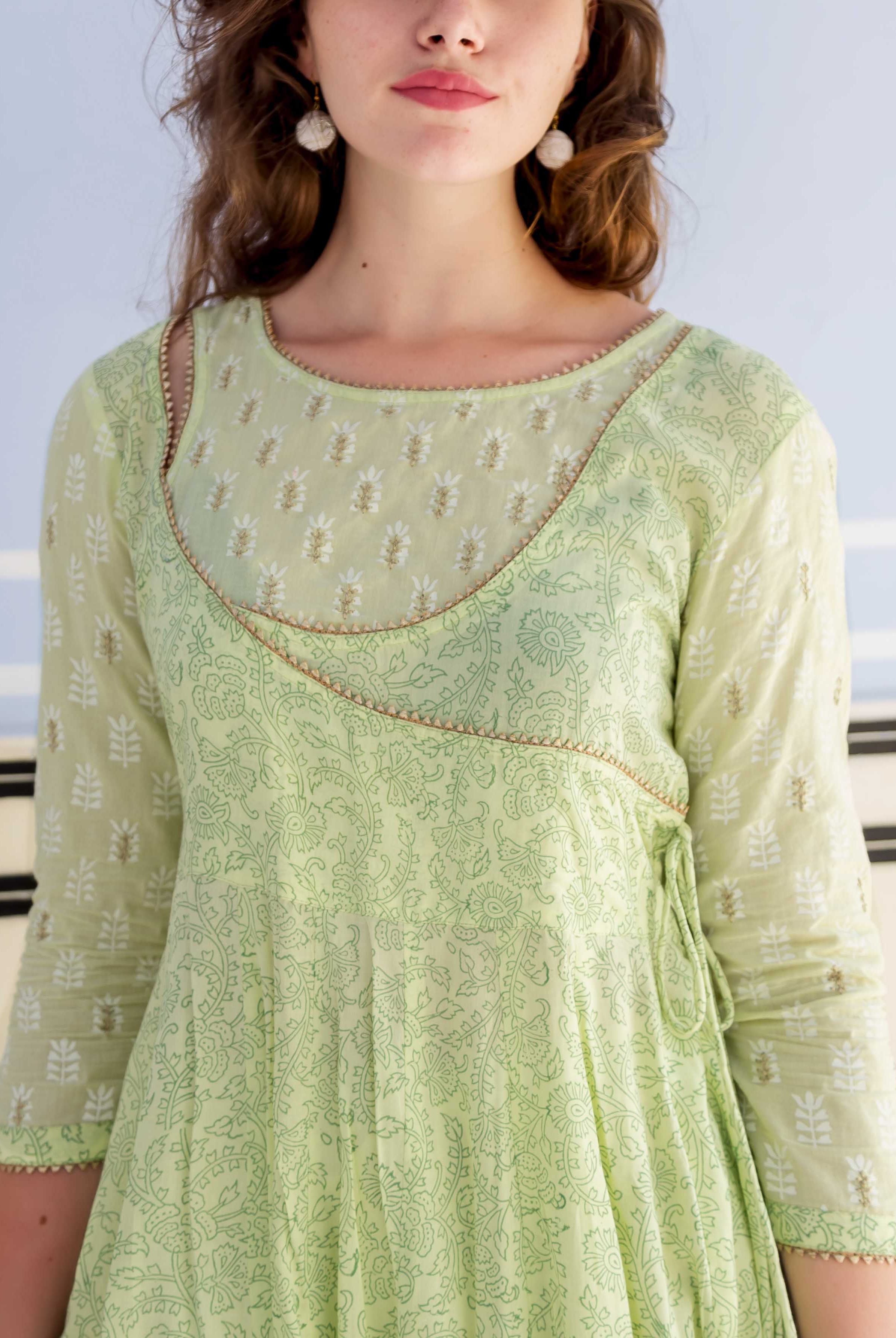 Lime green hand block printed Anarkali kurta on model, angrakha neckline with subtle embroidery and tie-up.