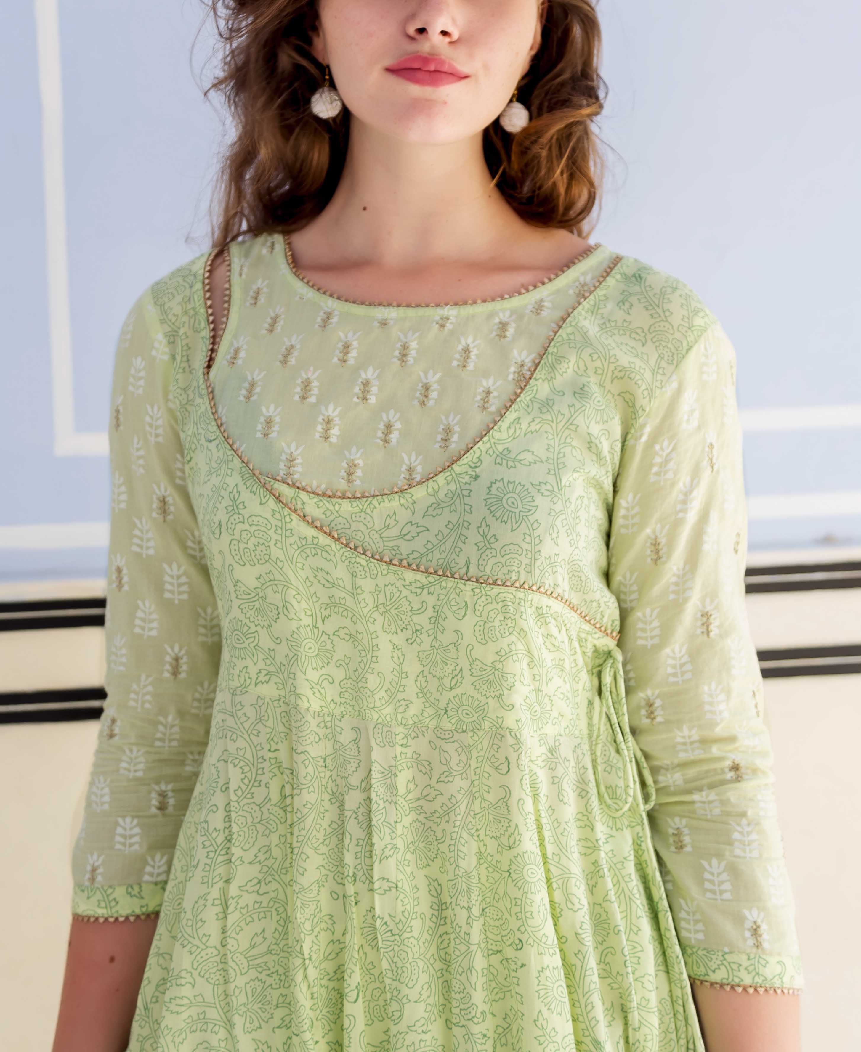Lime green hand block printed Anarkali kurta on model, angrakha neckline with subtle embroidery and tie-up.