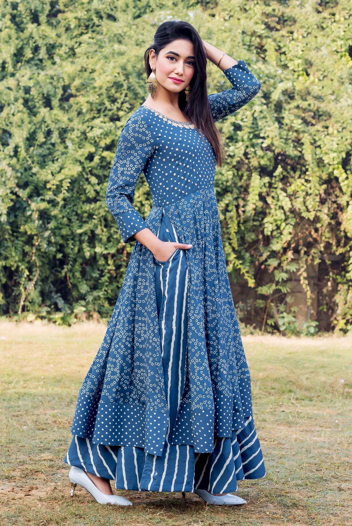 Full-length indigo and white printed embroidered layered dress on model.