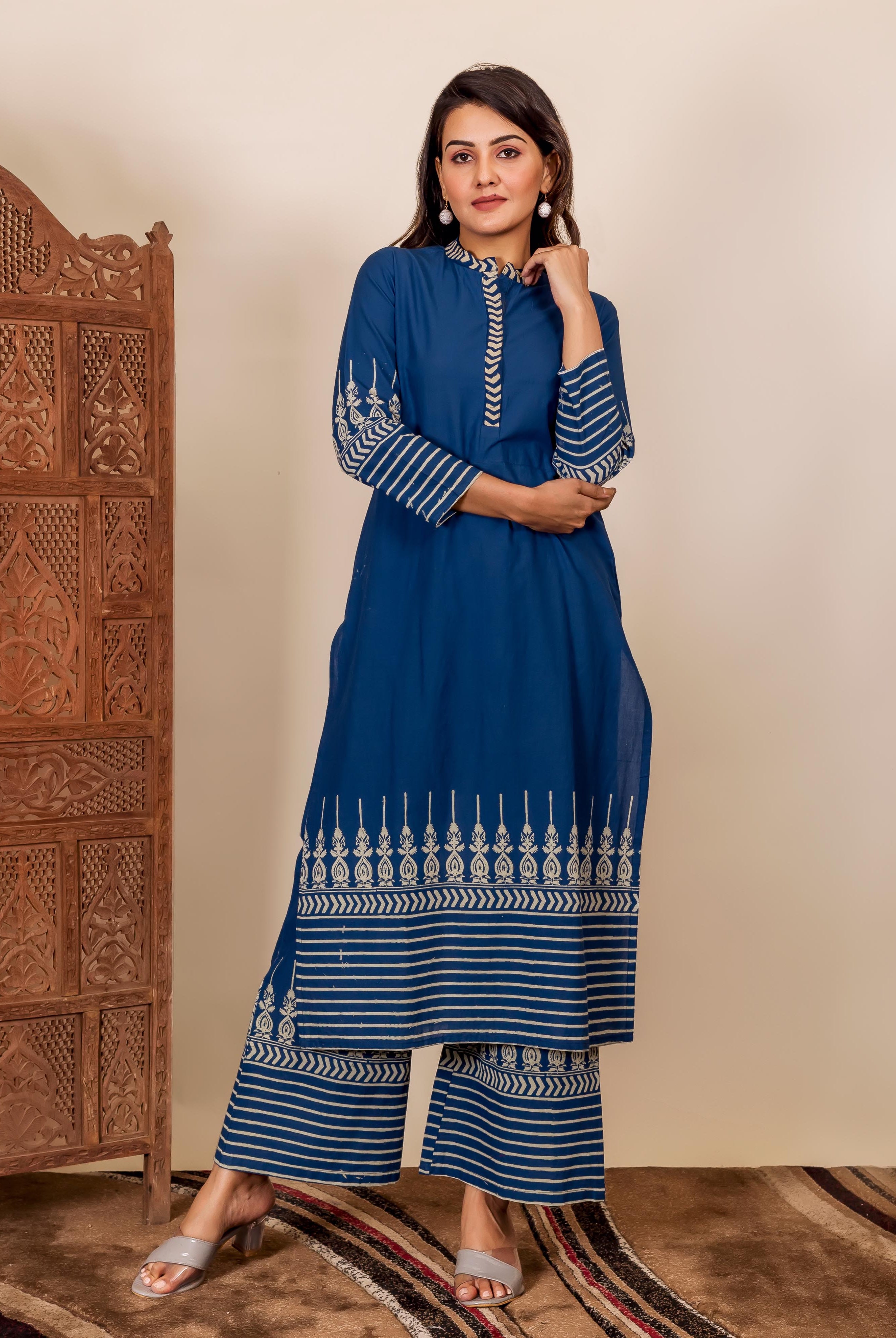 Full look on model in indigo blue hand block printed ethnic kurta and palazzo.