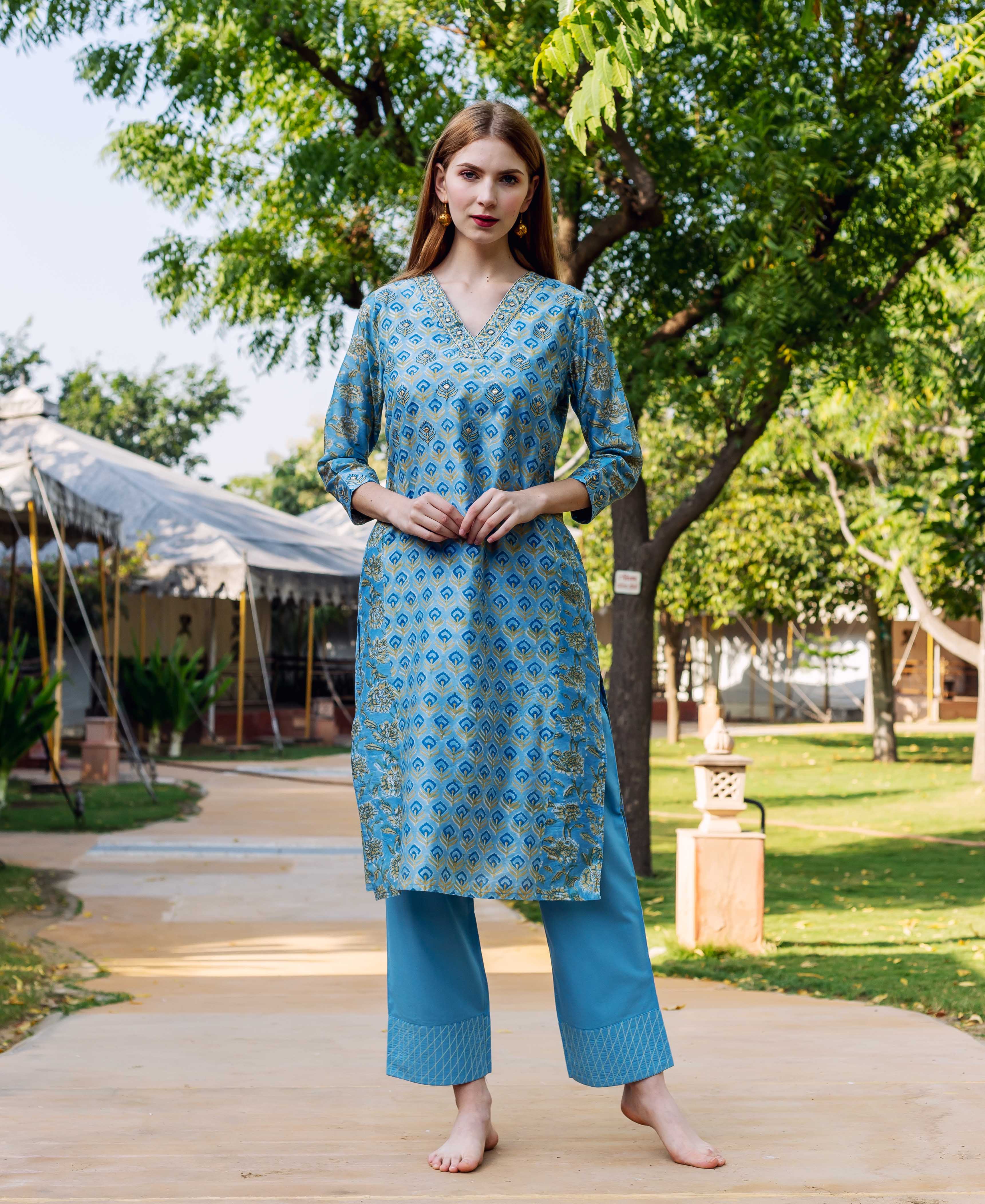 Model wearing an Allora Blue hand-block-printed V-neck straight kurta with matching pants.