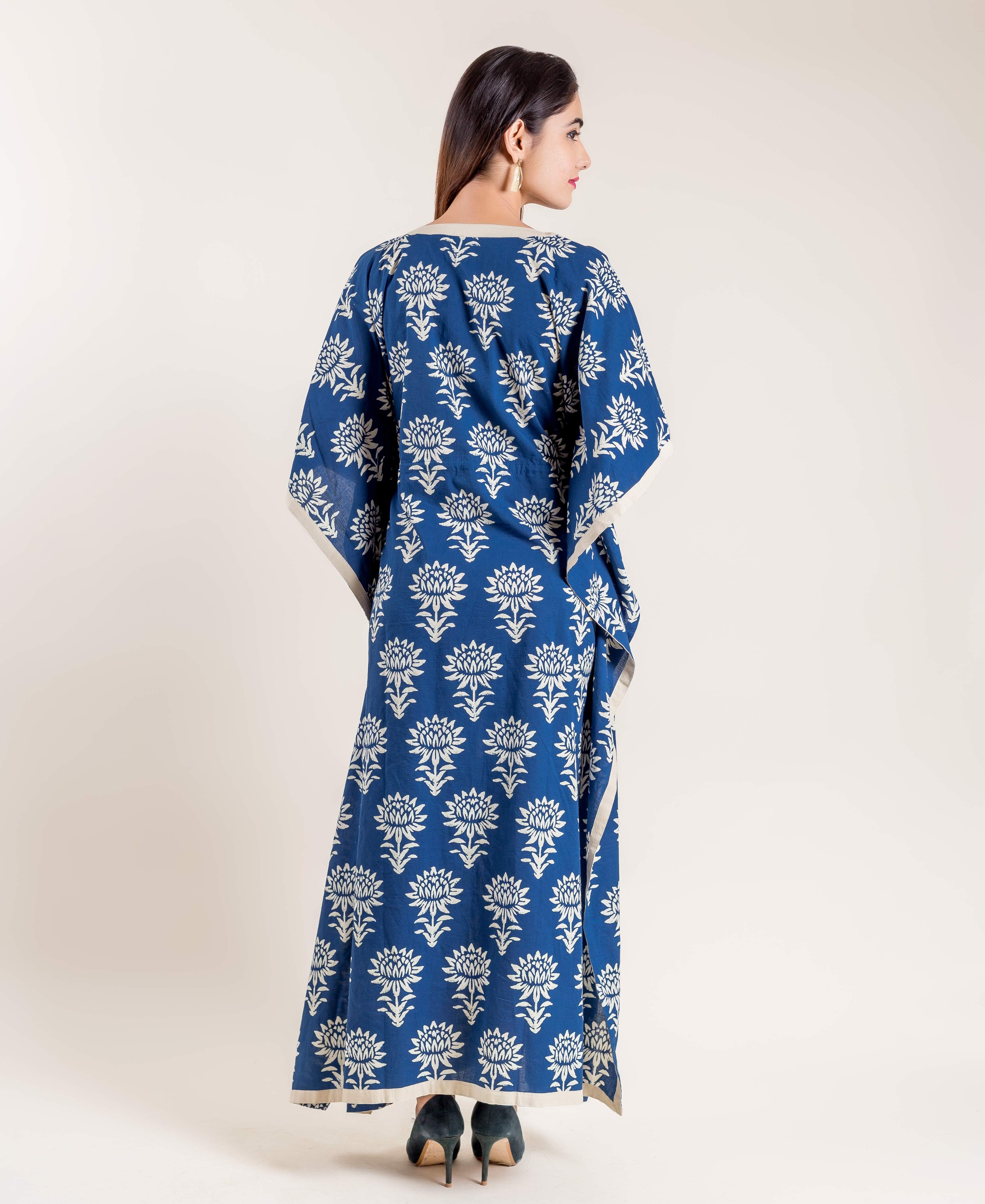 Back view of a model wearing a full-length indigo floral hand block printed kaftan.