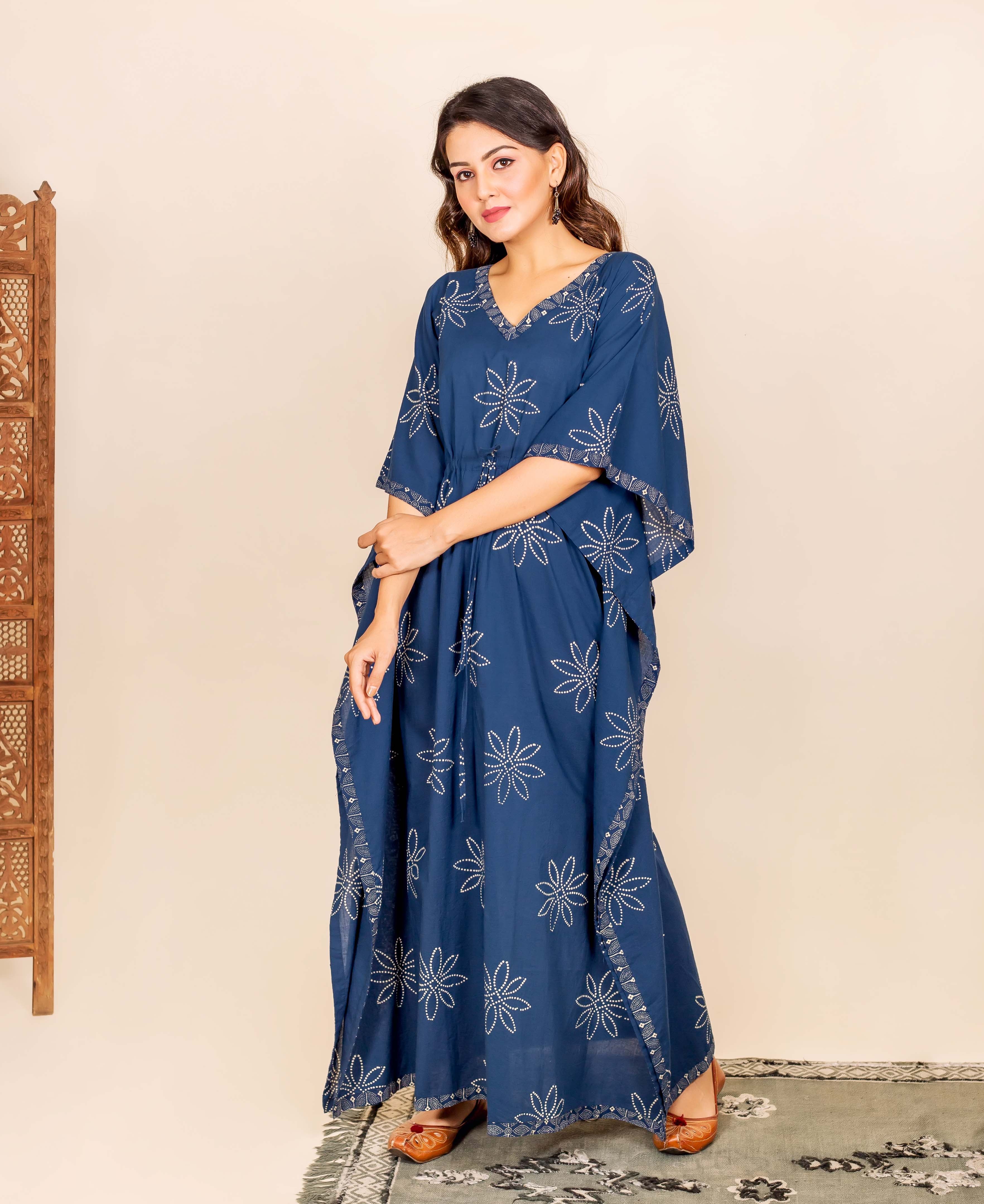 Full-length photo of model in an indigo hand block printed star kaftan.