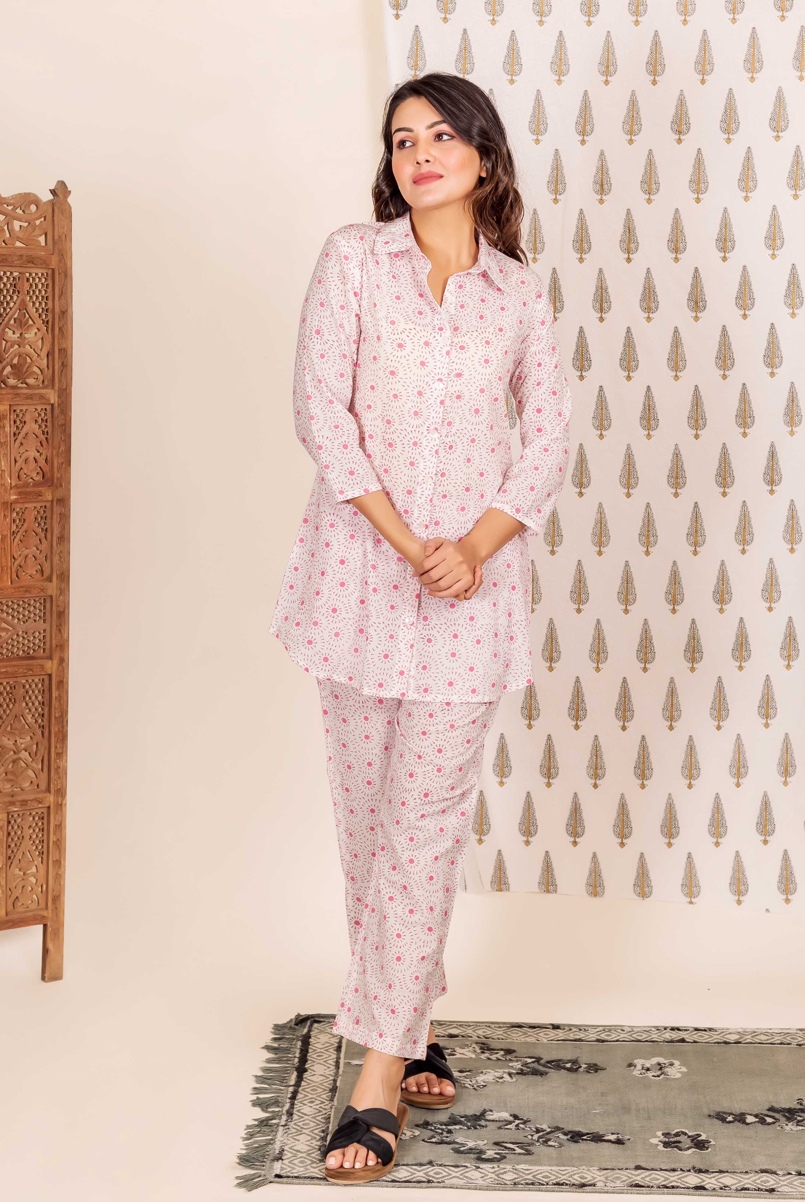 Full shot of model in a Missprint hand-block-printed pink shirt style pajama set.