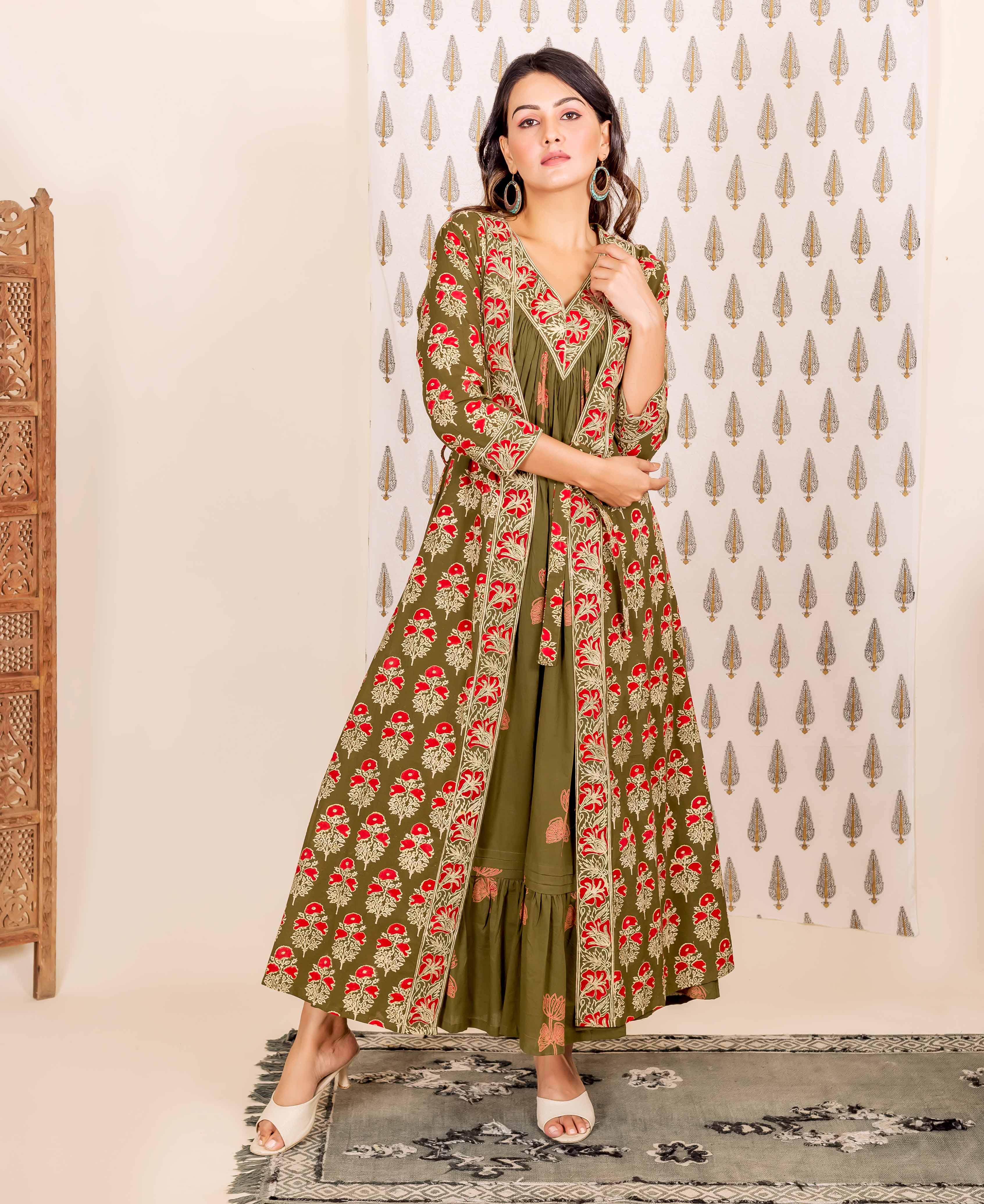 Model wearing olive green and red hand-block printed ethnic dress and long overlay.
