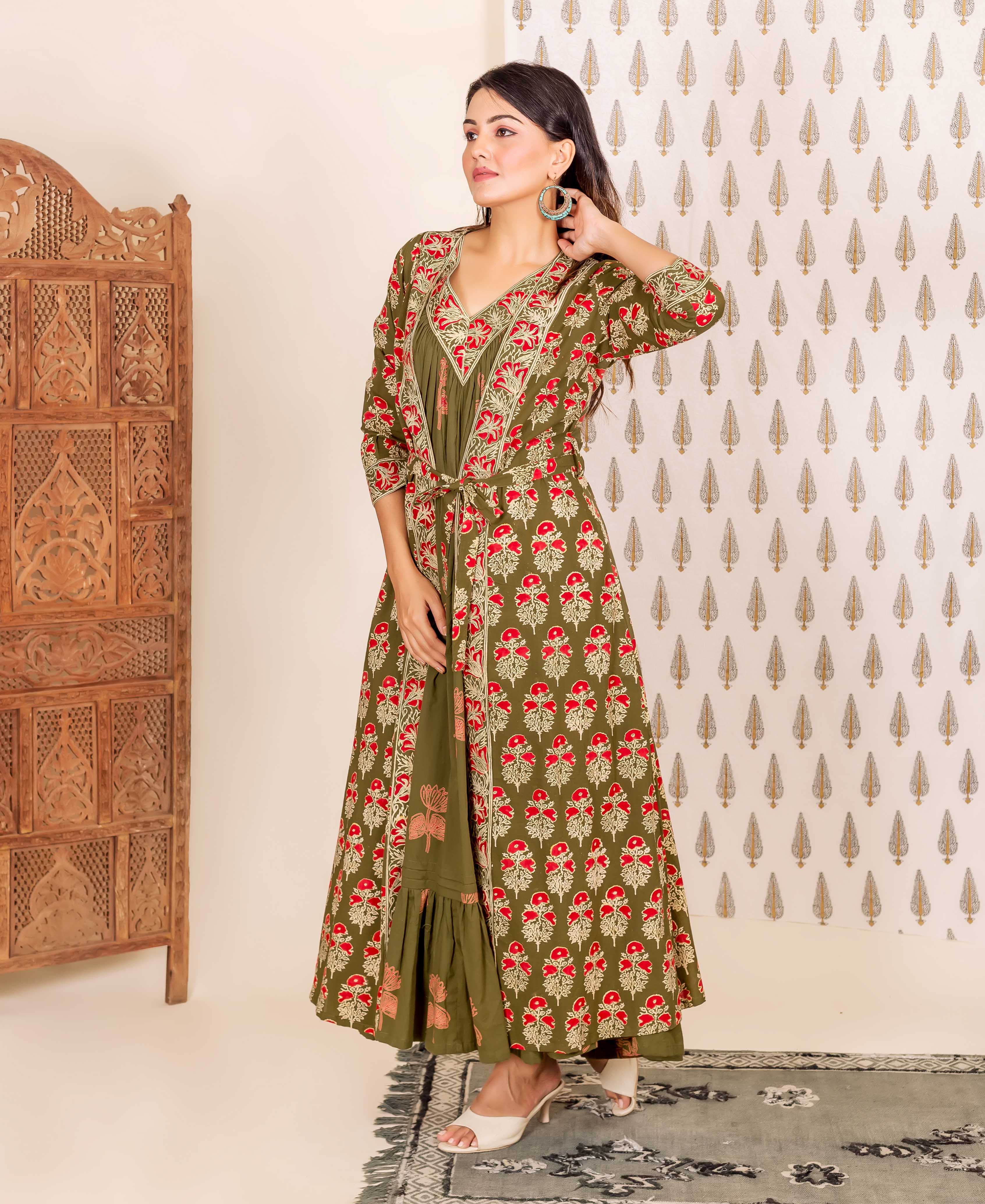 Model in full-length olive green and red hand-block-printed ethnic nighty and overlay set.