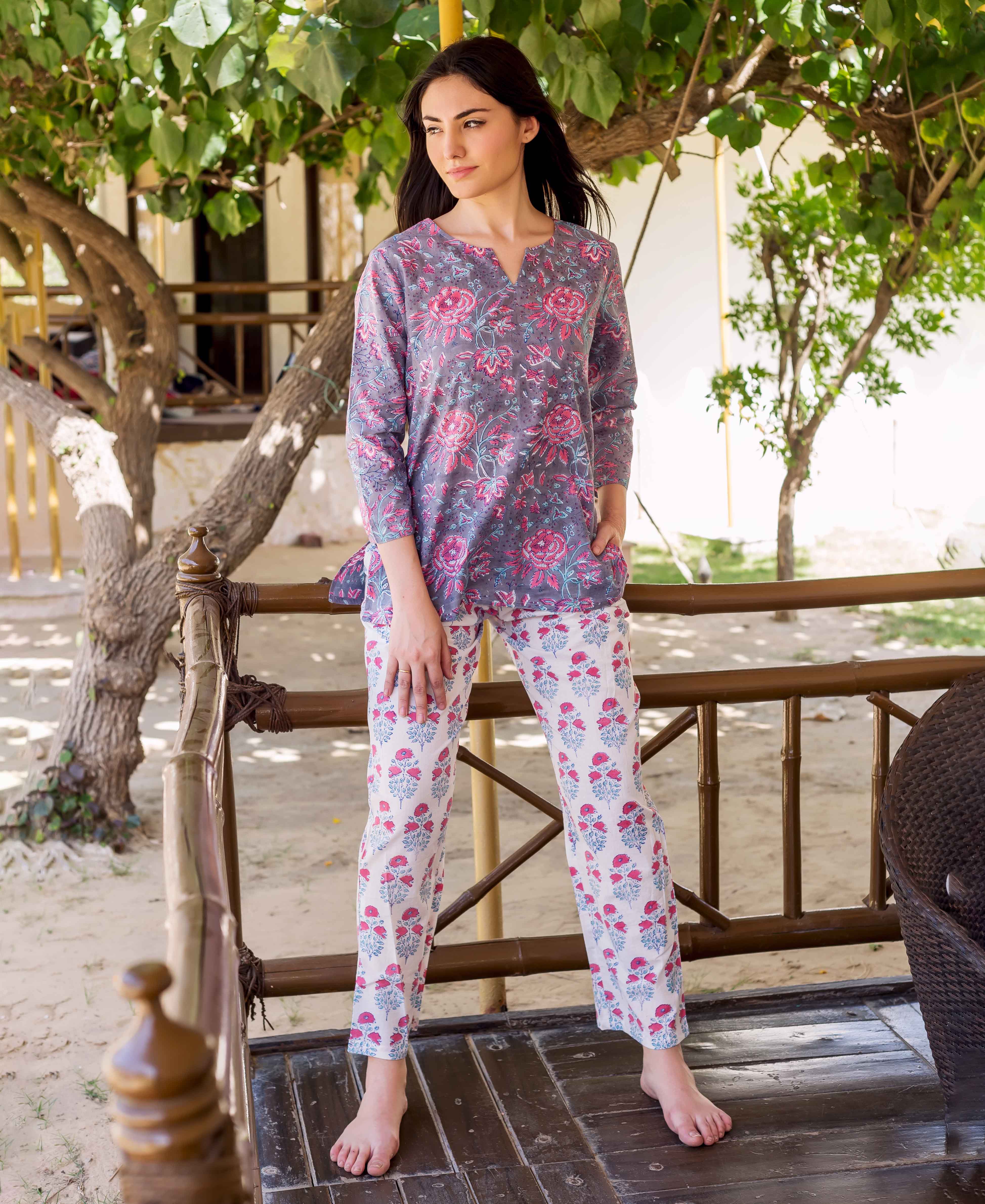 Model wearing full look of grey and white floral hand block printed lounge wear.