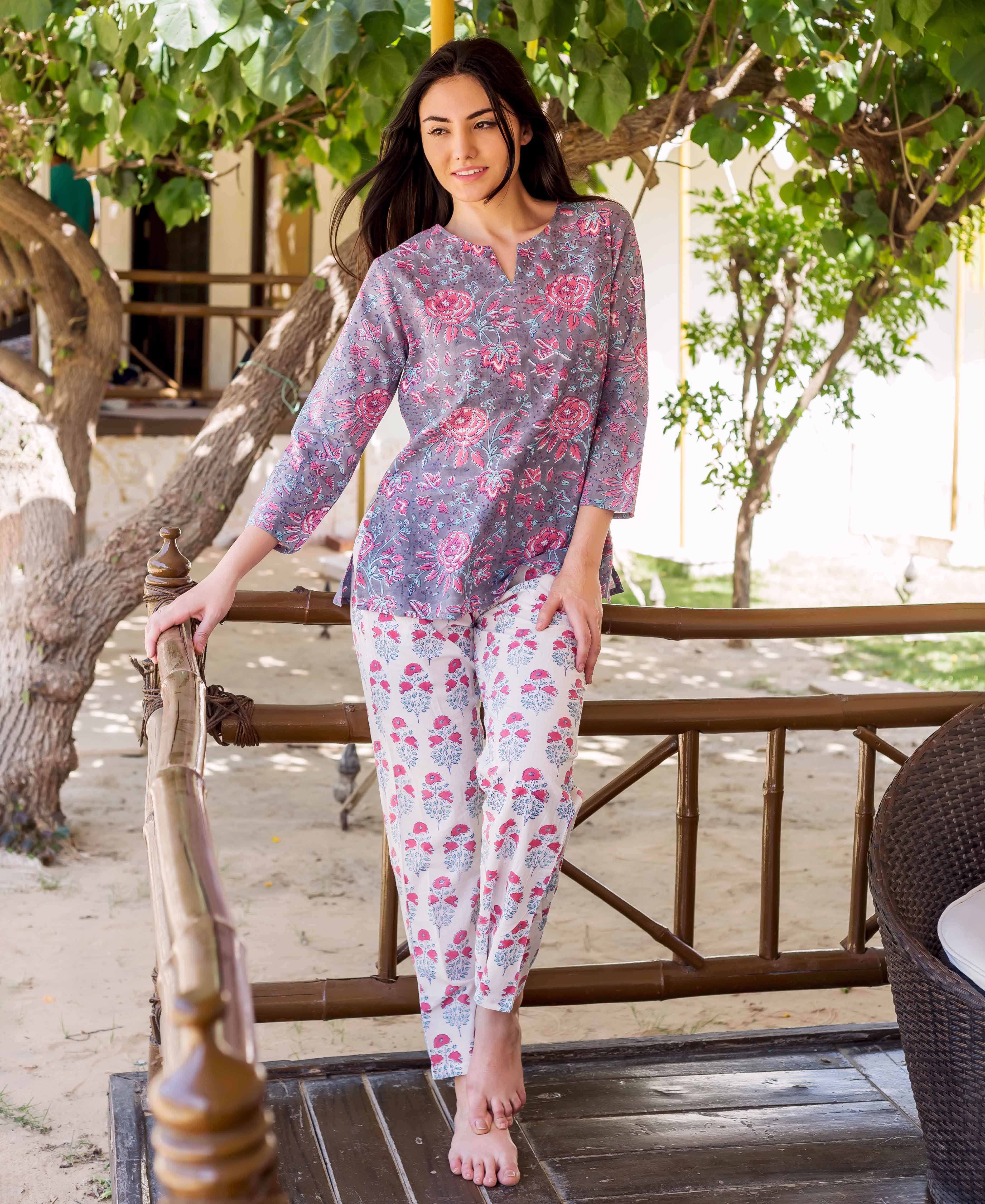 Grey and pink hand block printed floral lounge wear on a standing model.