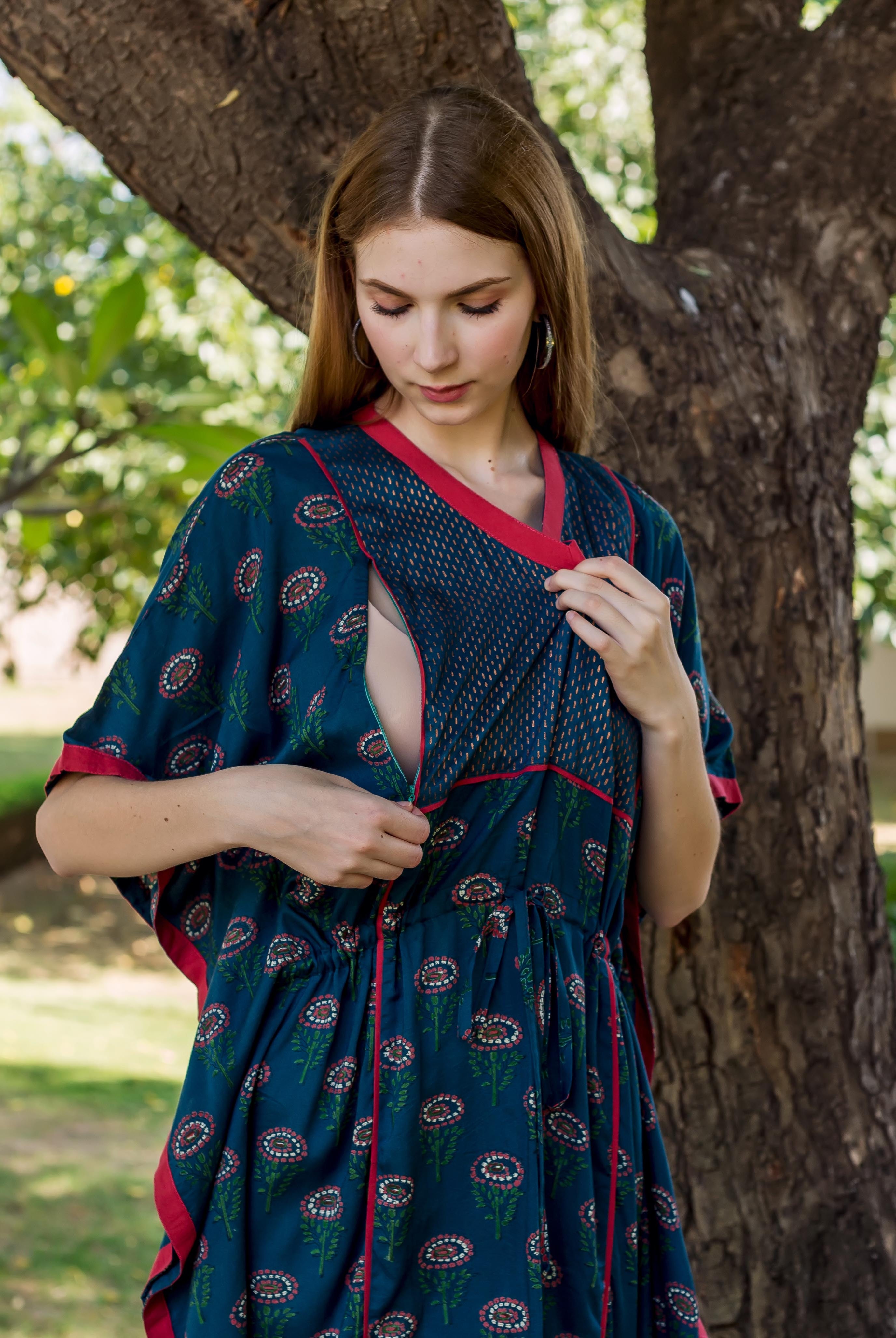 Model in peacock green hand-block-printed kaftan with red trim, revealing its front nursing access.