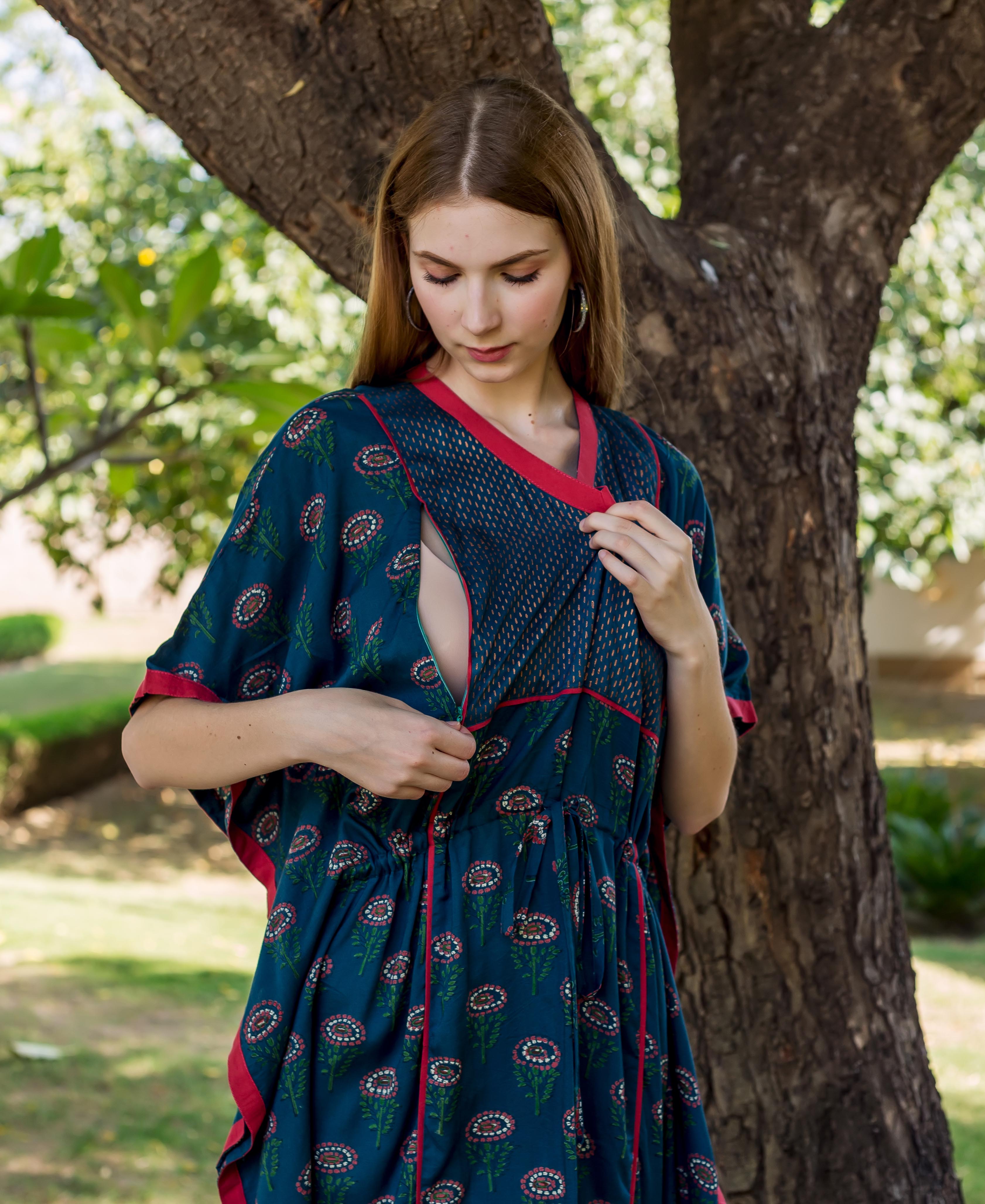 Model in peacock green hand-block-printed kaftan with red trim, revealing its front nursing access.