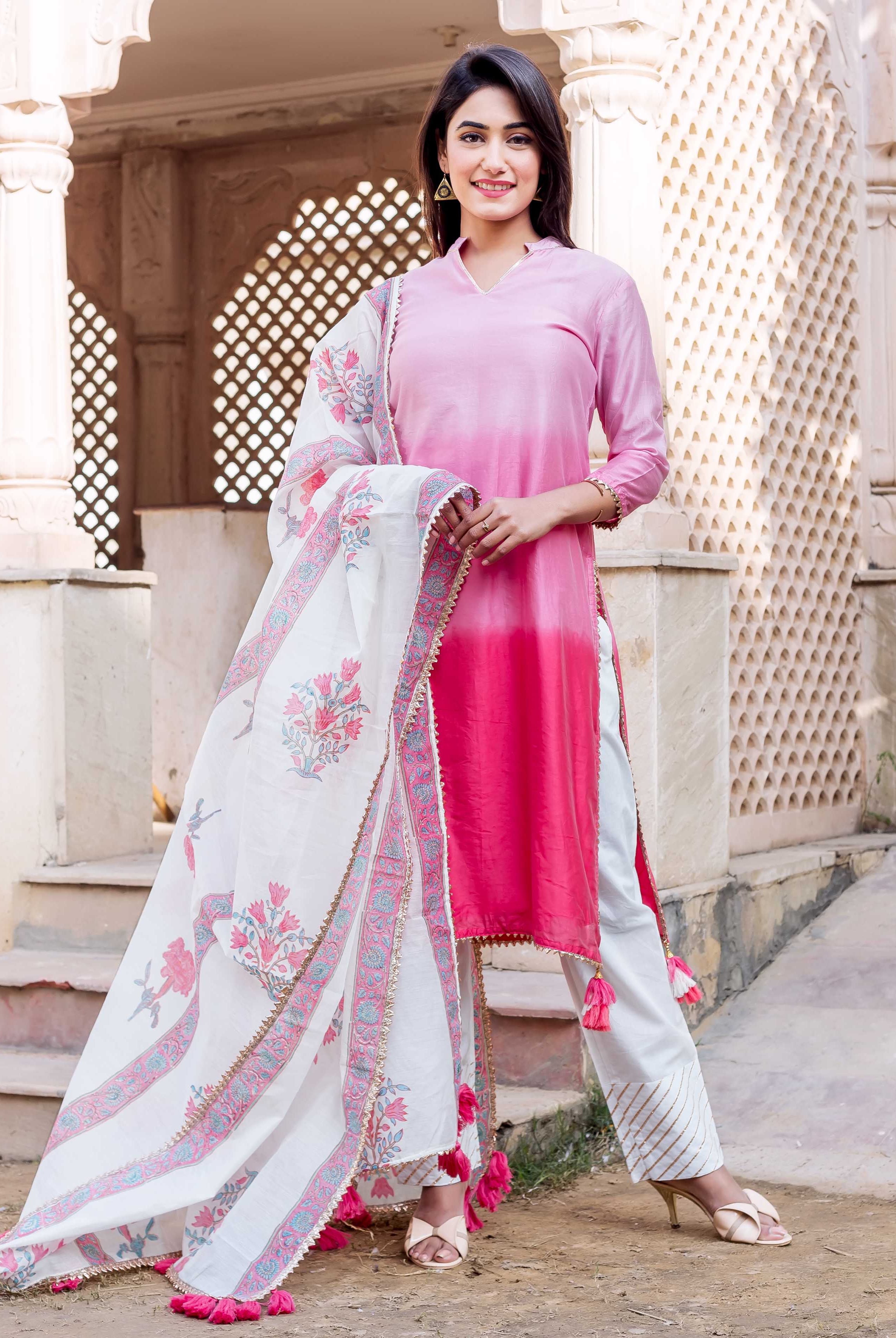Full-length shot: Woman in ombre pink kurta and white floral hand-block printed dupatta.