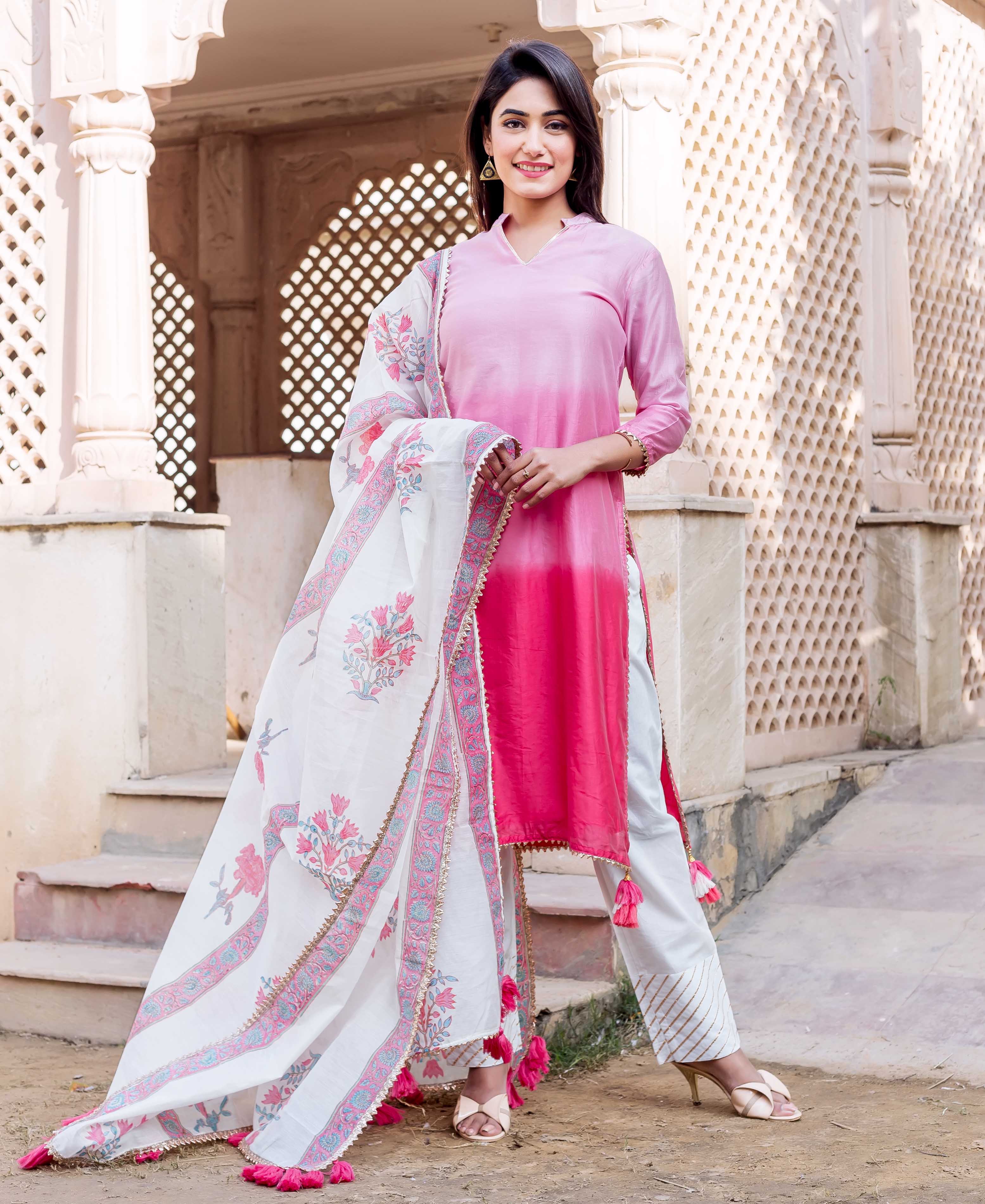 Full-length shot: Woman in ombre pink kurta and white floral hand-block printed dupatta.