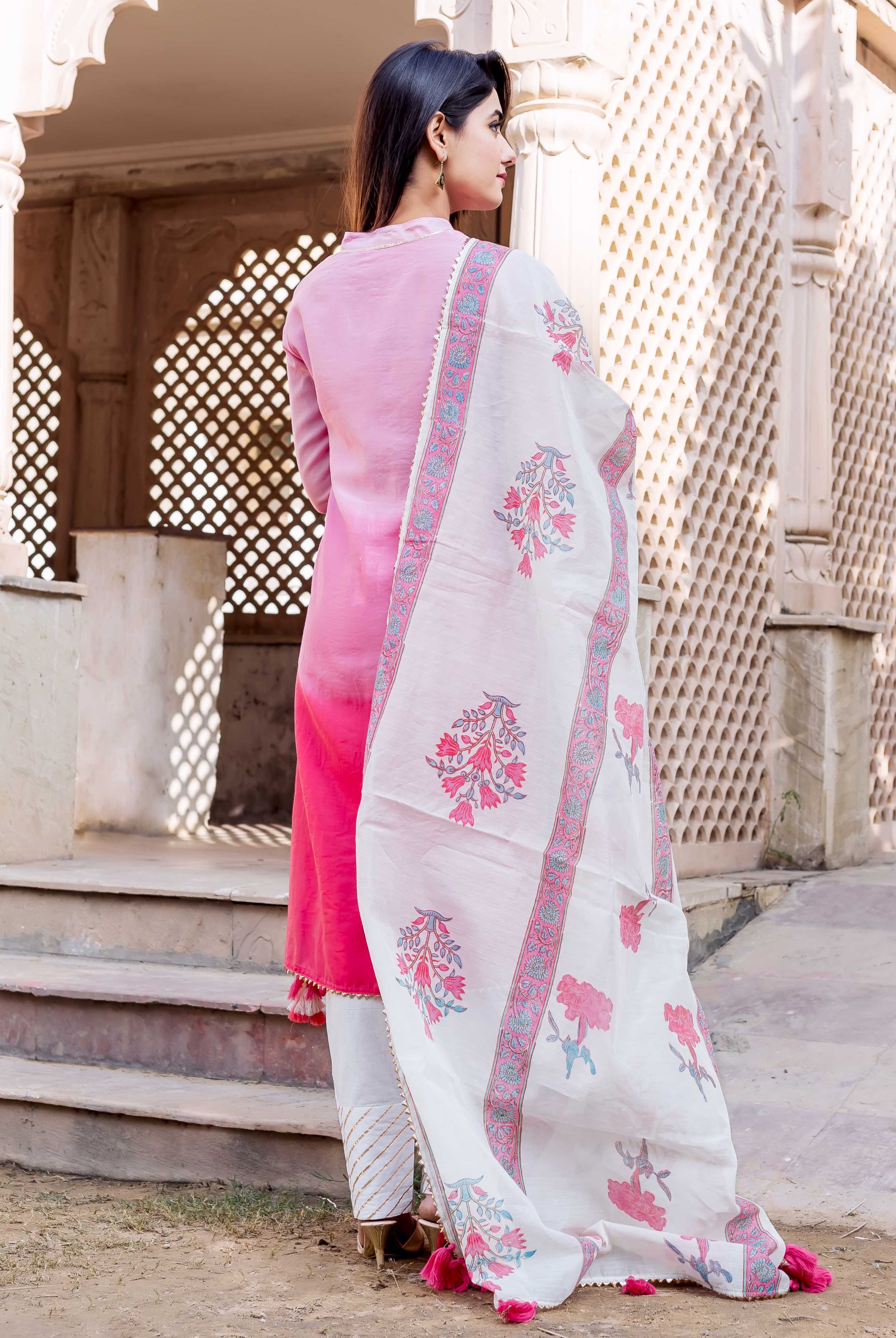 Back view: model wears ombre pink kurta with white floral hand-block printed dupatta.