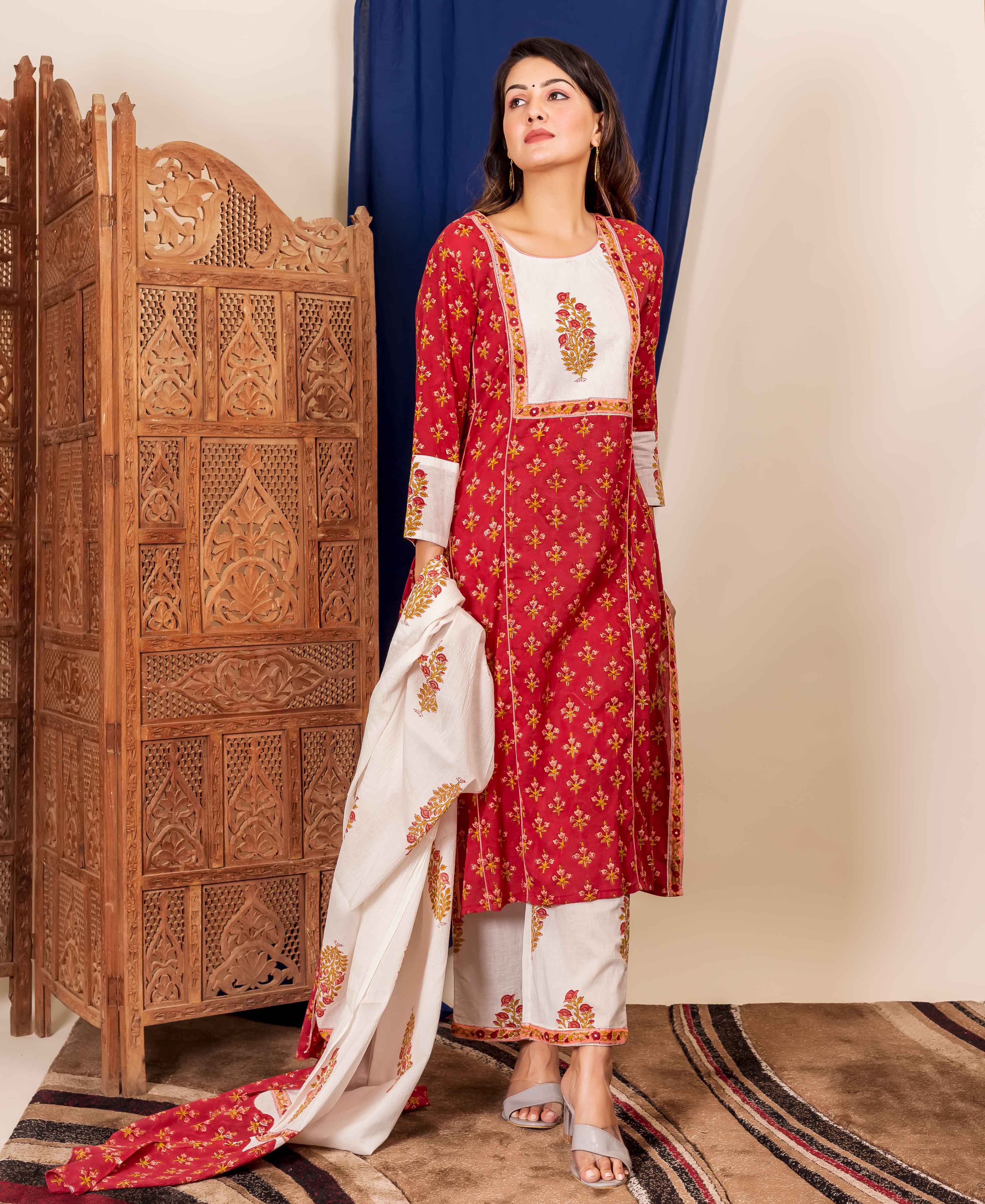 Full-body model in maroon and white hand-block-printed kurta set with peach floral patterns.