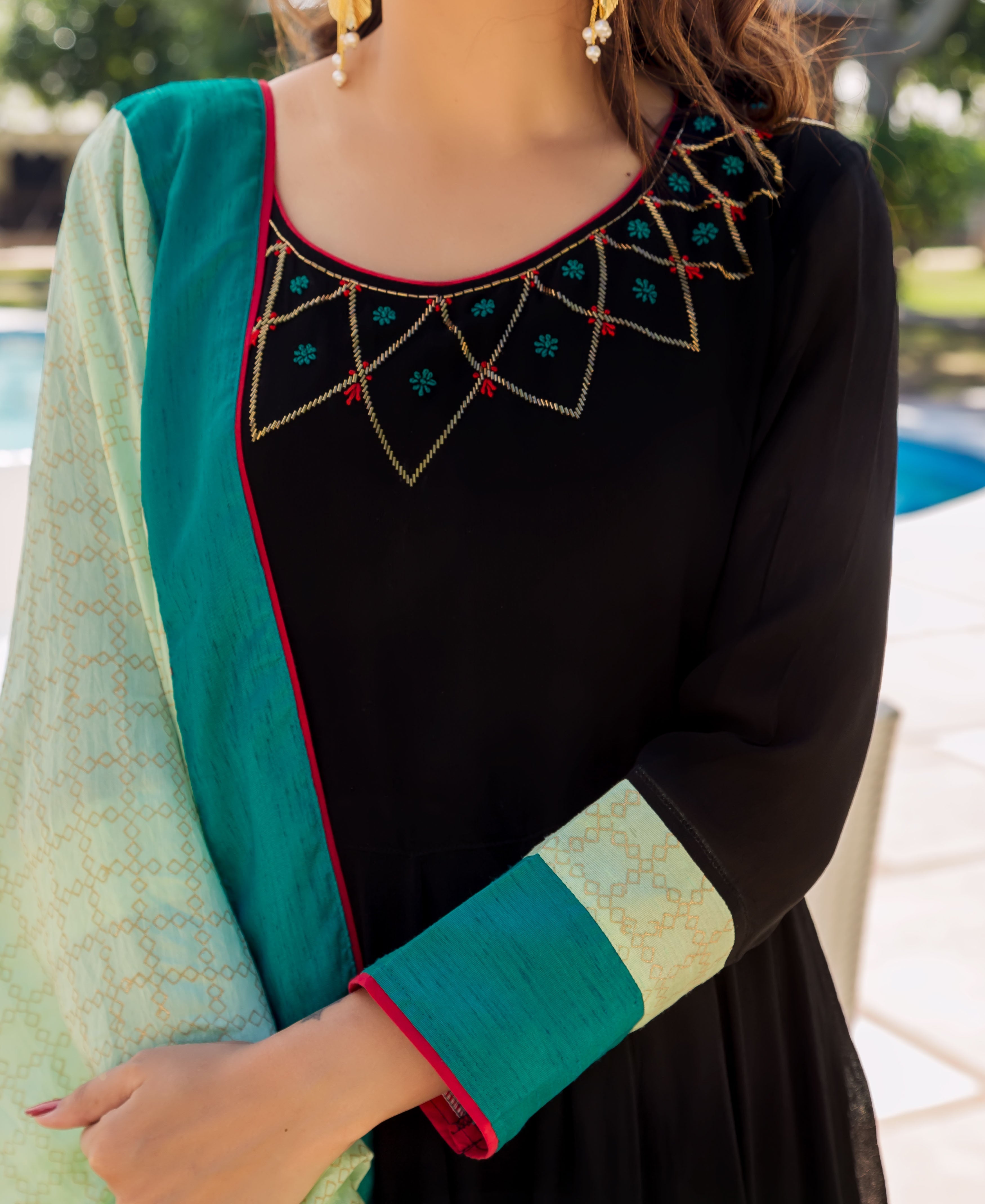 Black and lime Anarkali dress with embroidered neckline and patterned cuffs and dupatta.