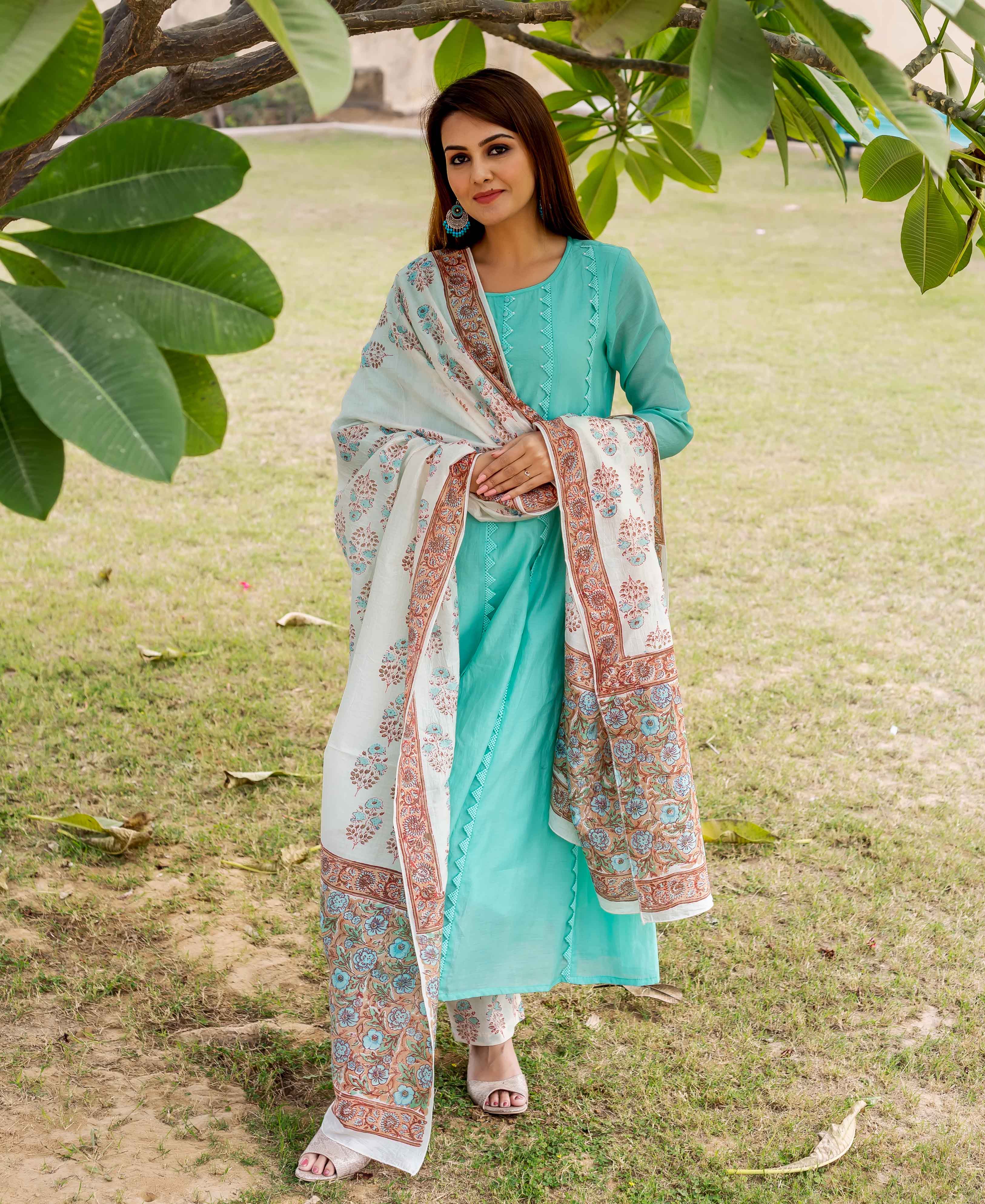 Front full look: model in sea green embroidered kurta, floral block-printed dupatta, pants.