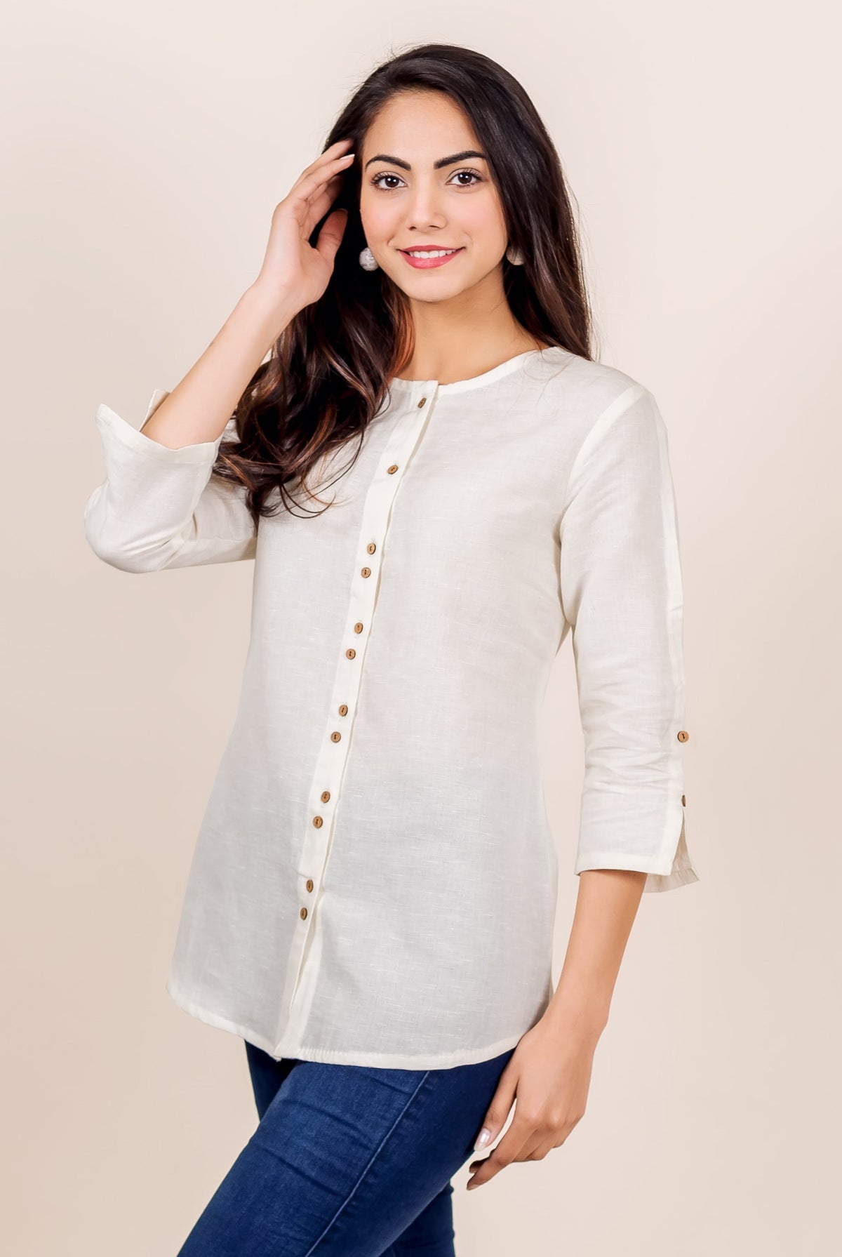 Antique white linen top with hand block print and wooden buttons down front and on sleeves.