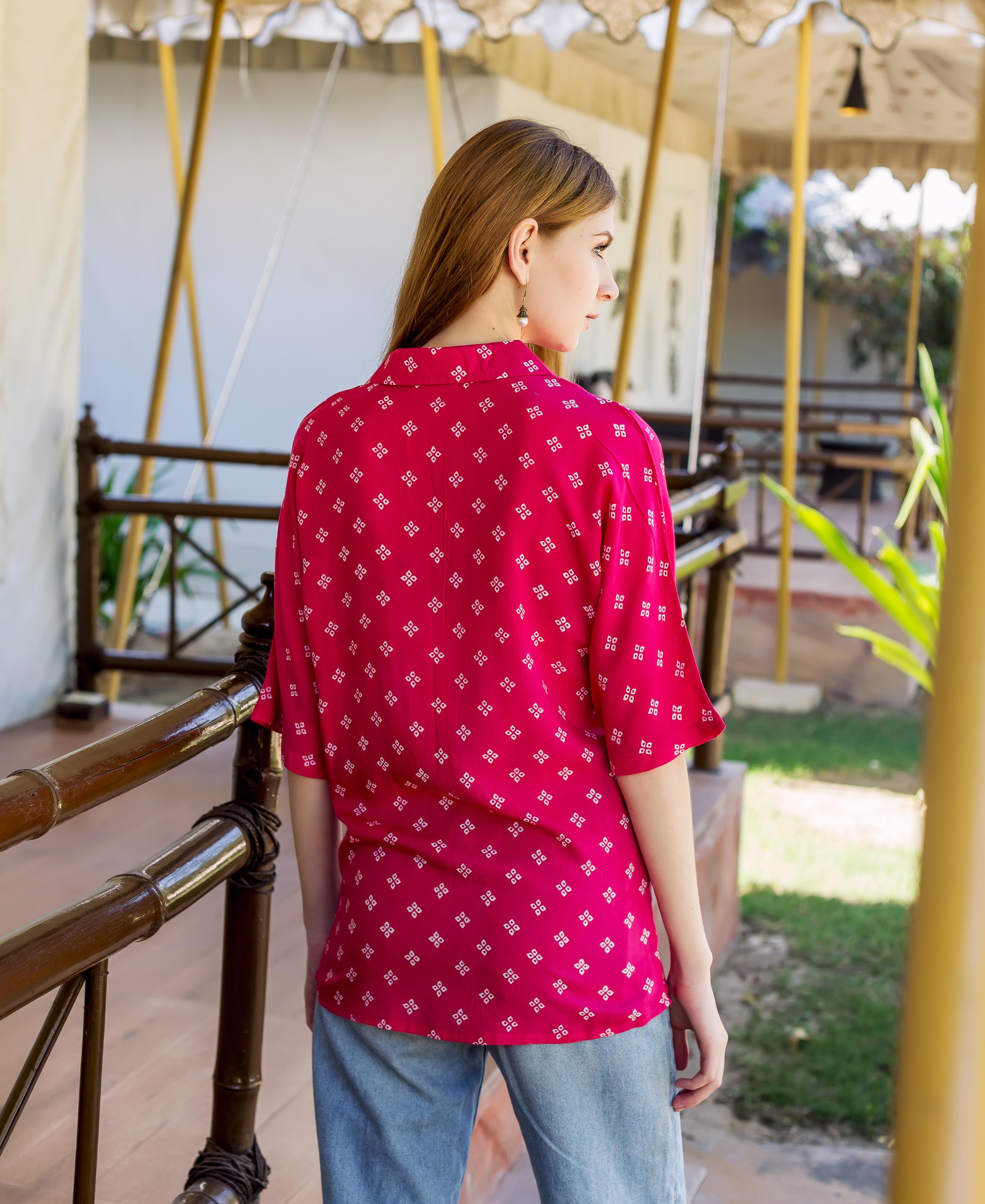 Magenta bandhej printed button down shirt on model from behind, showing white square pattern.