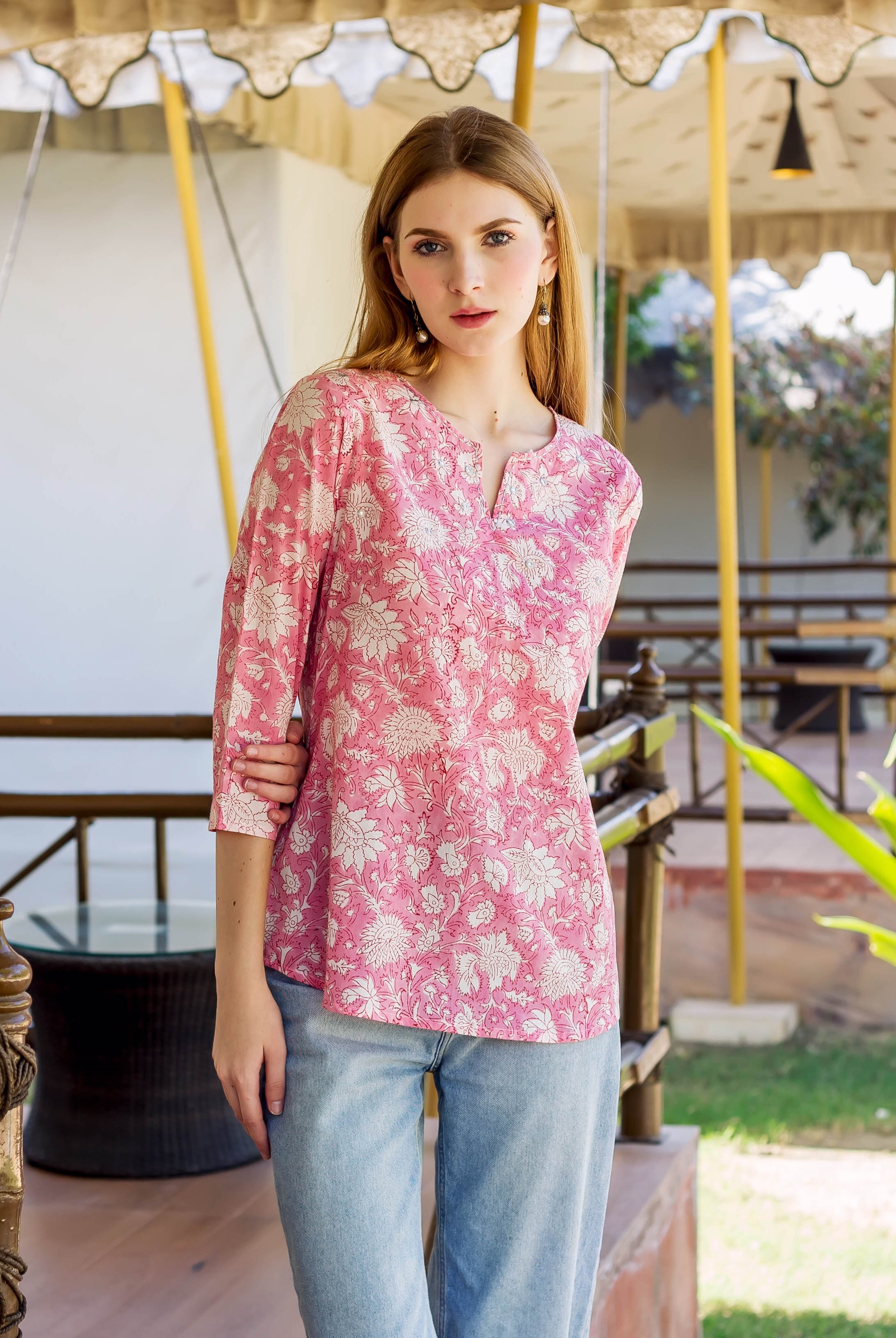 Model in a pink and white hand-block-printed floral Samantha Top.