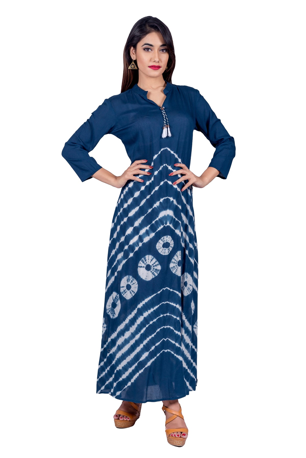 Model in indigo tie-dye tasseled Indo Western dress with white stripes and circles.