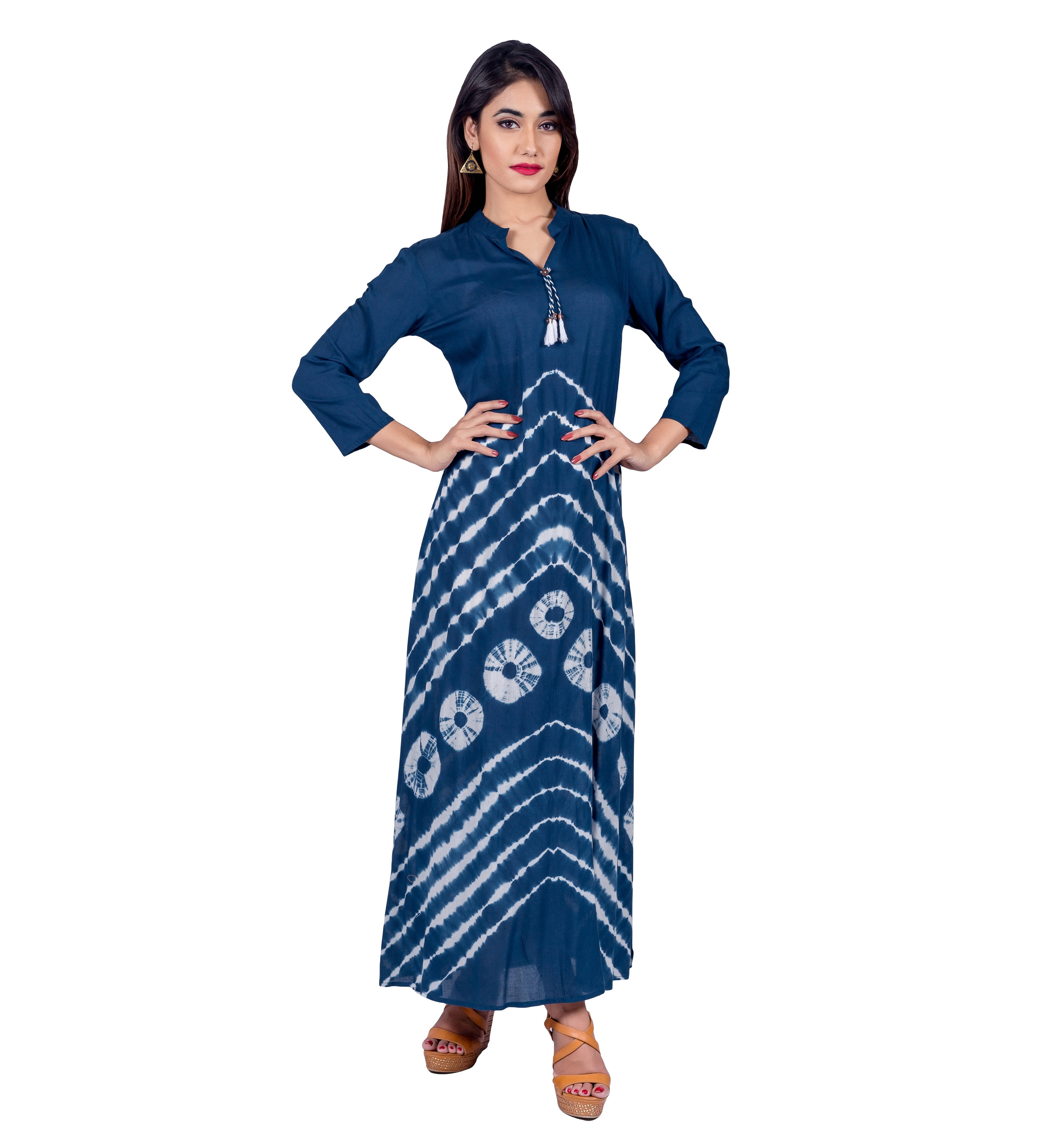 Model in indigo tie-dye tasseled Indo Western dress with white stripes and circles.
