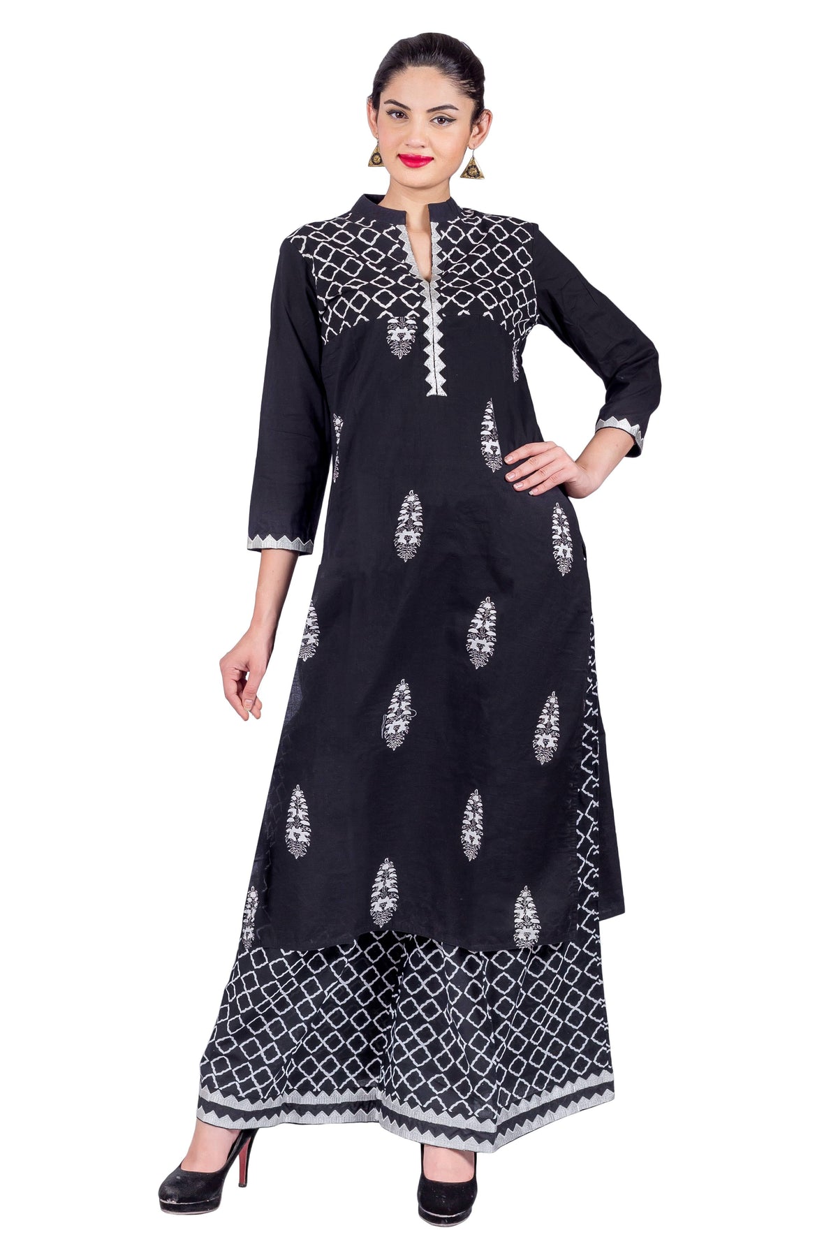 Front full look of model in black hand-block-printed mandarin neck kurta and palazzo.