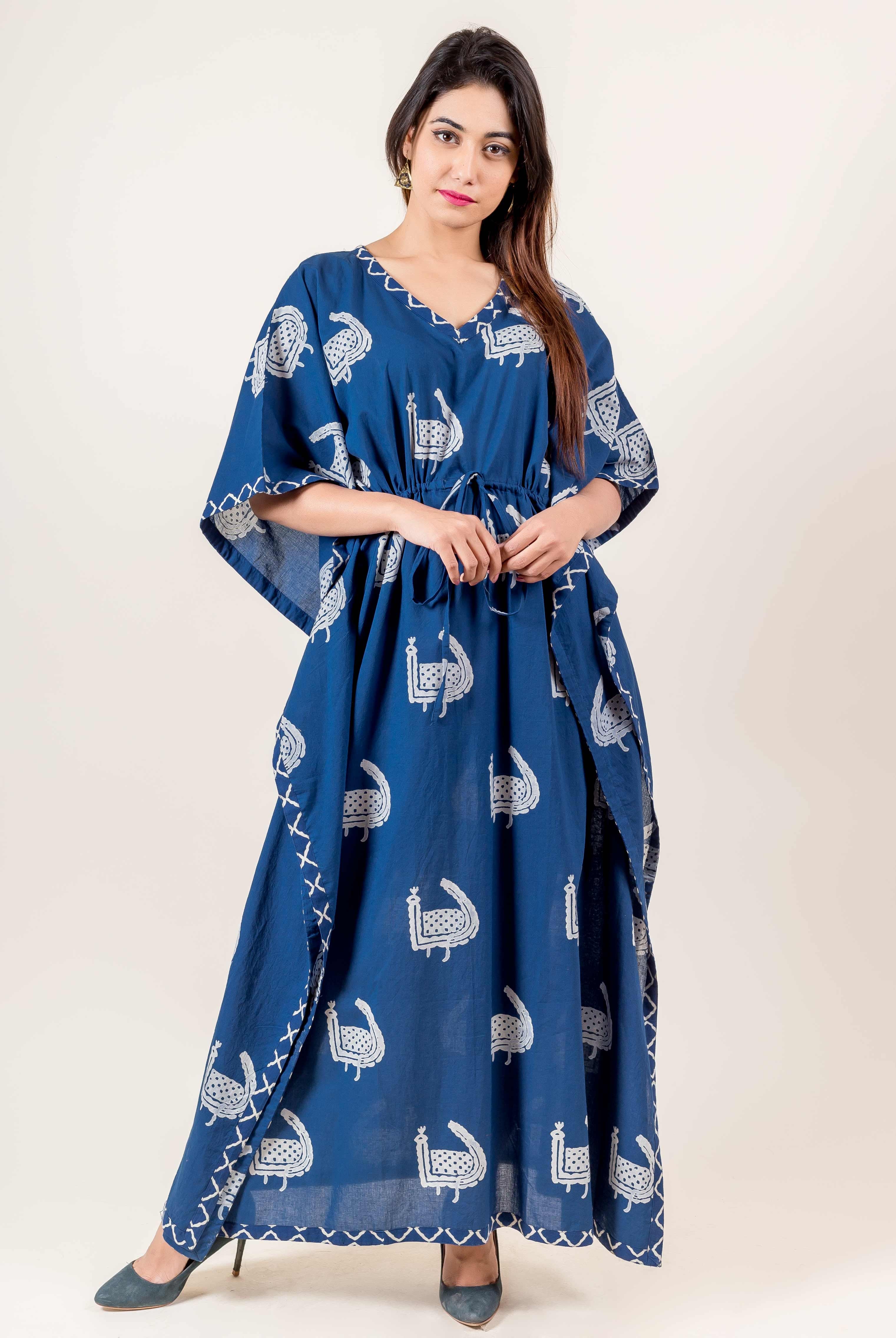 Front full shot of model wearing blue V-neck kaftan with white hand-block bird print.