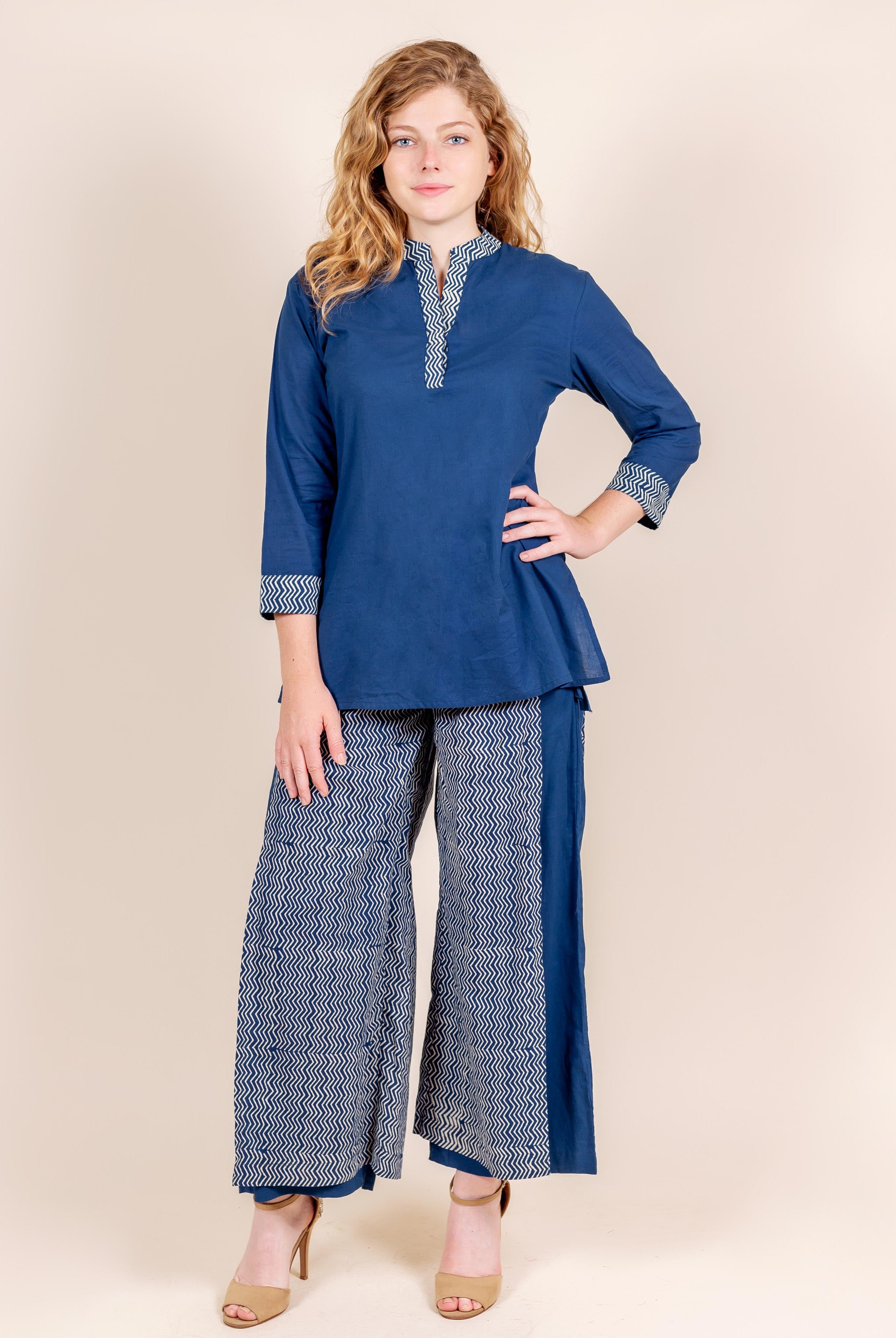 Front view model in indigo blue hand block print kurti and matching zigzag palazzo pants.