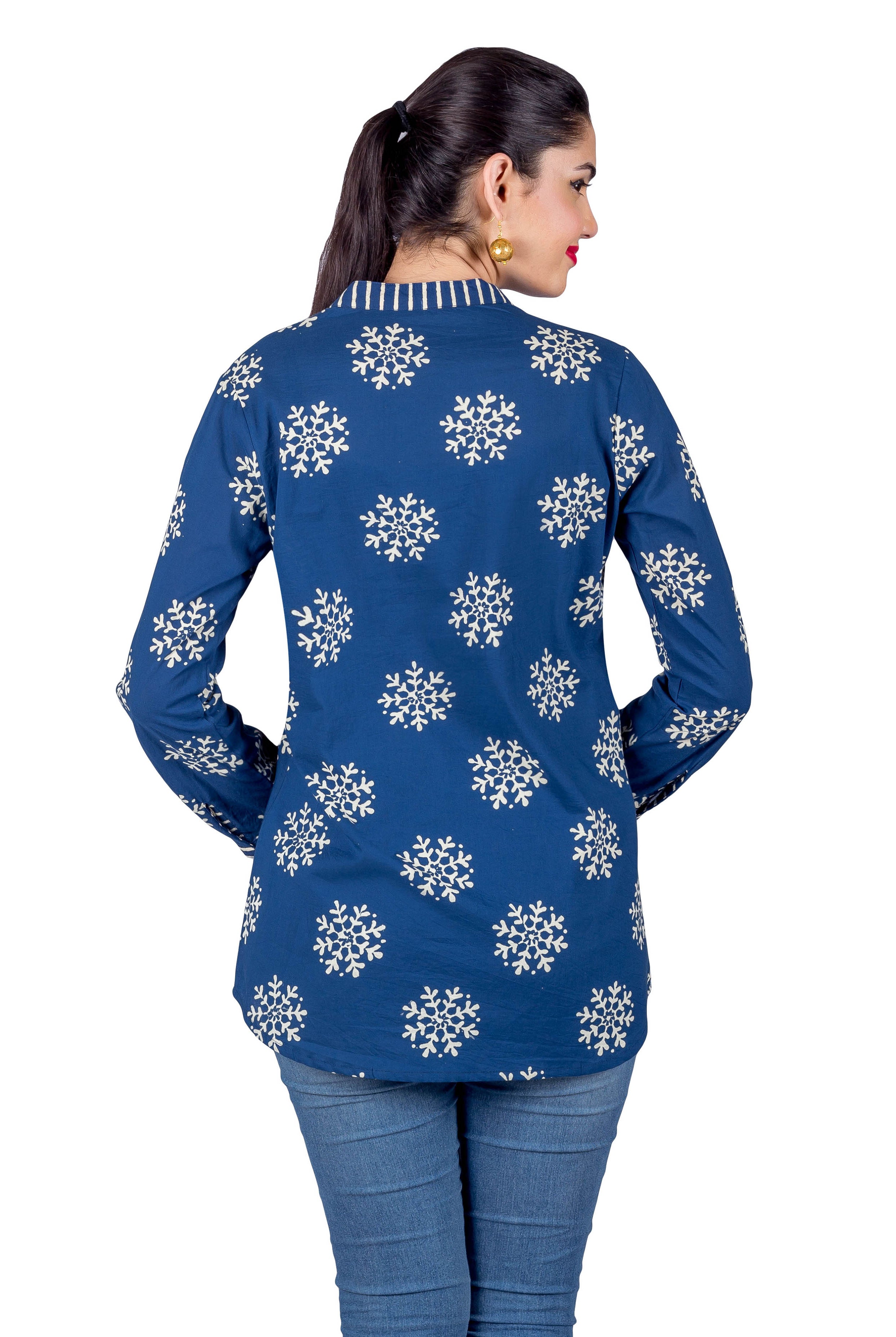Model's back in indigo blue buta printed short kurti with long sleeves and jeans.