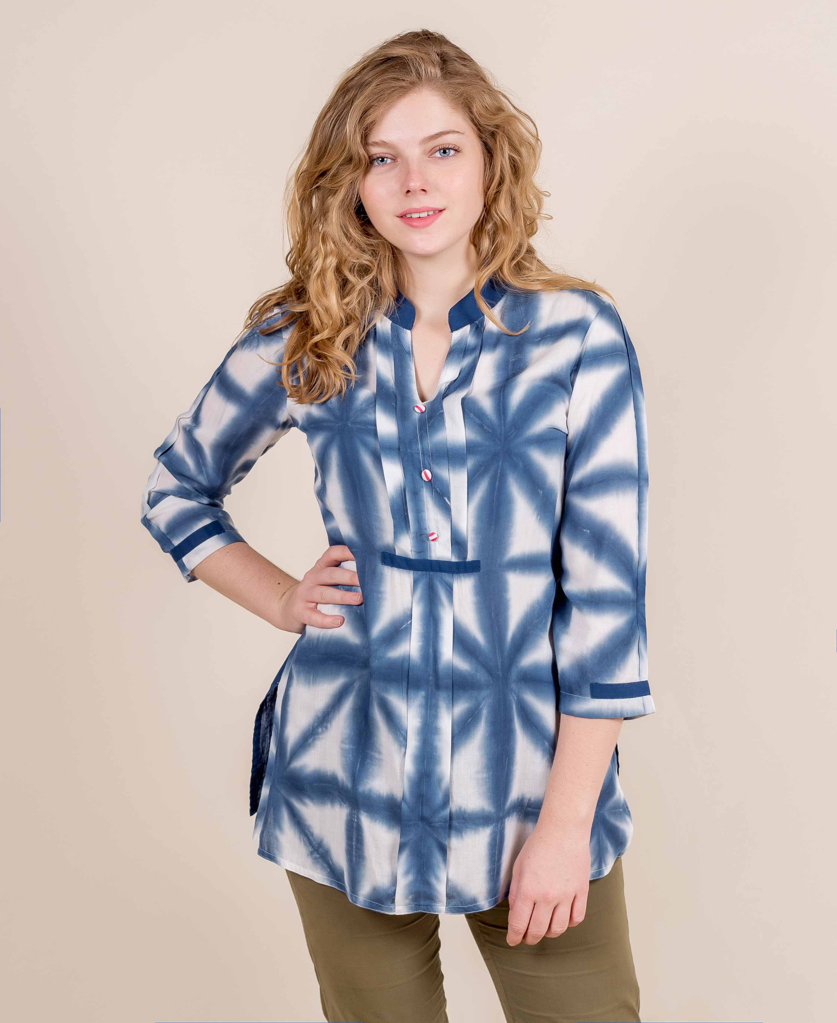 Front view of model wearing blue and white tie-dye pleated short kurta with mandarin collar.