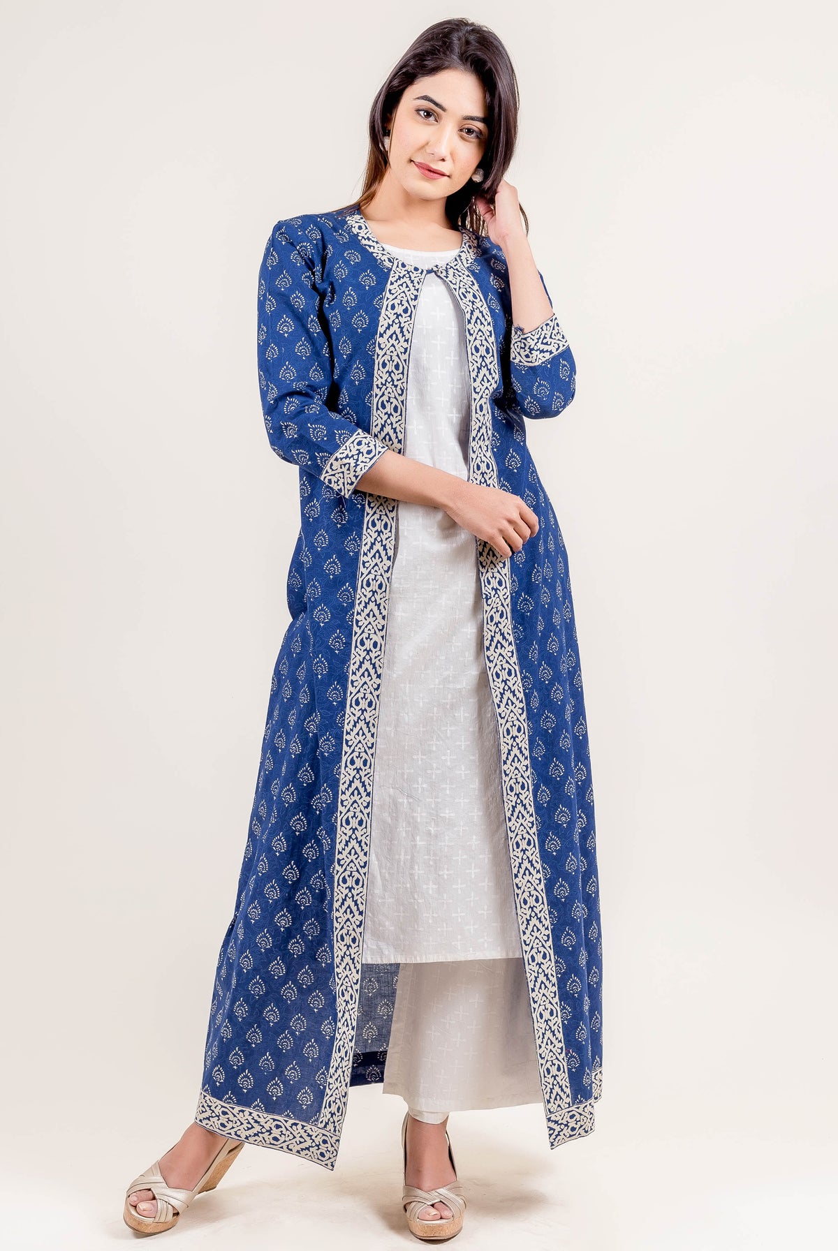 Front full look of a model in a blue hand block printed Indo-Western dress.
