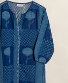 Missprint indigo handblock cotton dress with floral, polka dot, and striped patterns, on hanger.