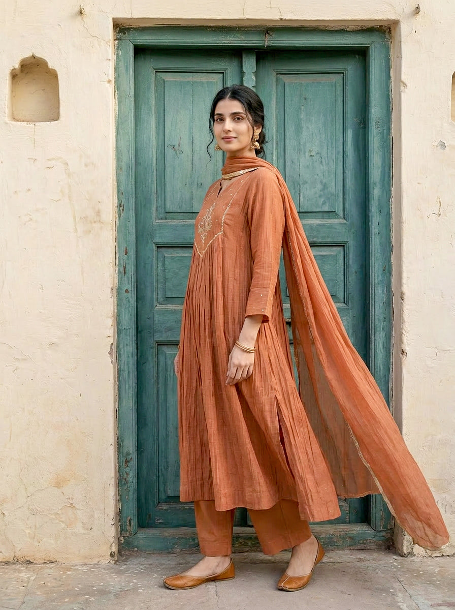 Rust Embroidered Mal Silk Chanderi Kurta Set with Pants & Dupatta — model front