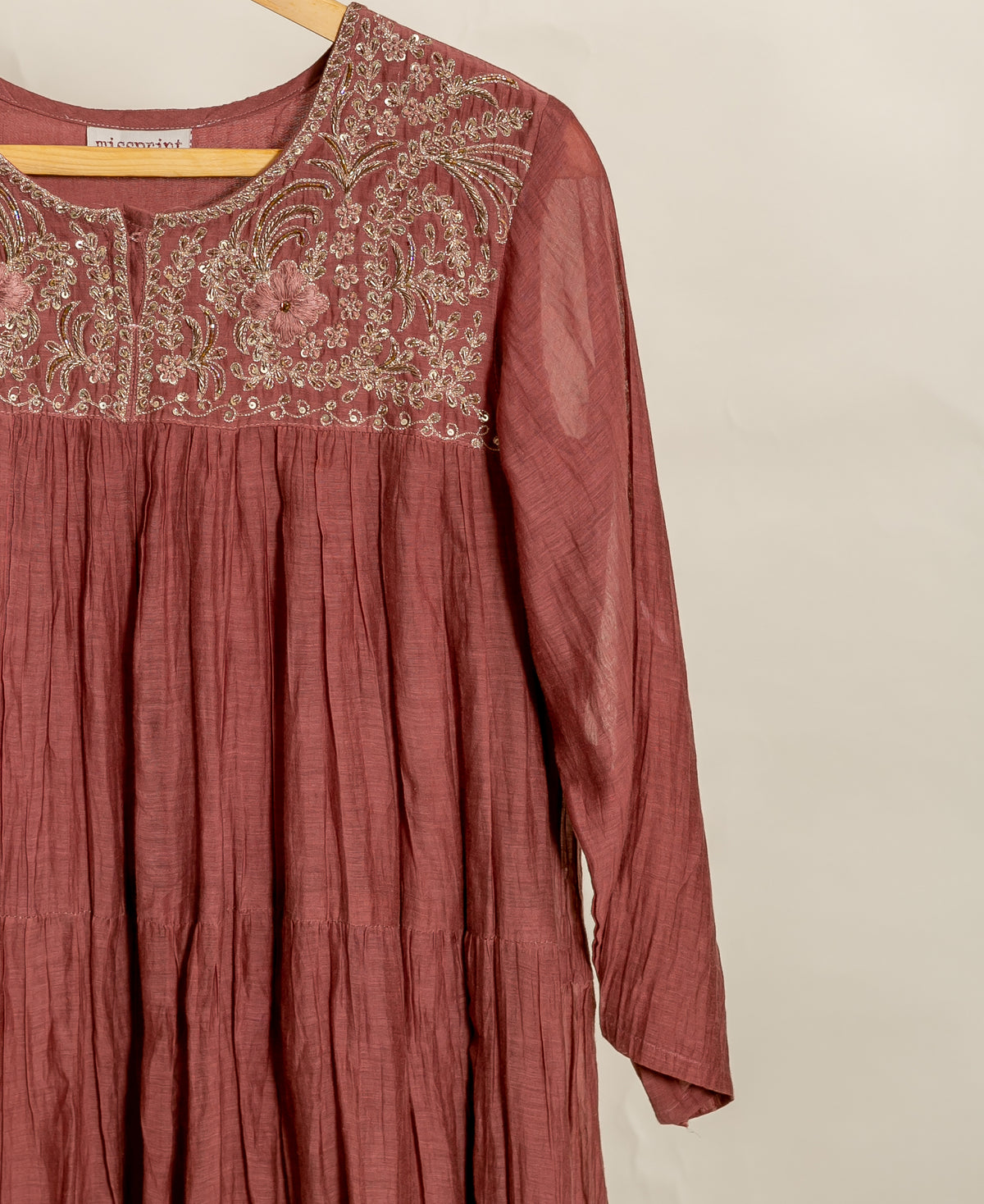 Rust Brown Embroidered Mul Silk Chanderi Kurta Set with Pants & Gold Print Dupatta — embroidered yoke and tiered kurta detail