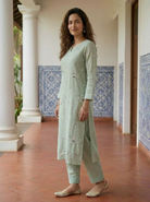 Sage Green Embroidered Silk Chanderi Kurta Set with Pants & Gold Border Dupatta — side view