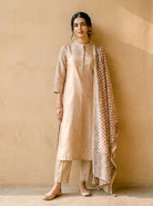 Beige Embroidered Silk Chanderi Kurta Set with Pants & Dupatta — model front