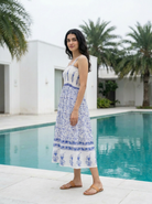 Blue & White Floral Cotton Smocked Midi Dress — three-quarter styled look